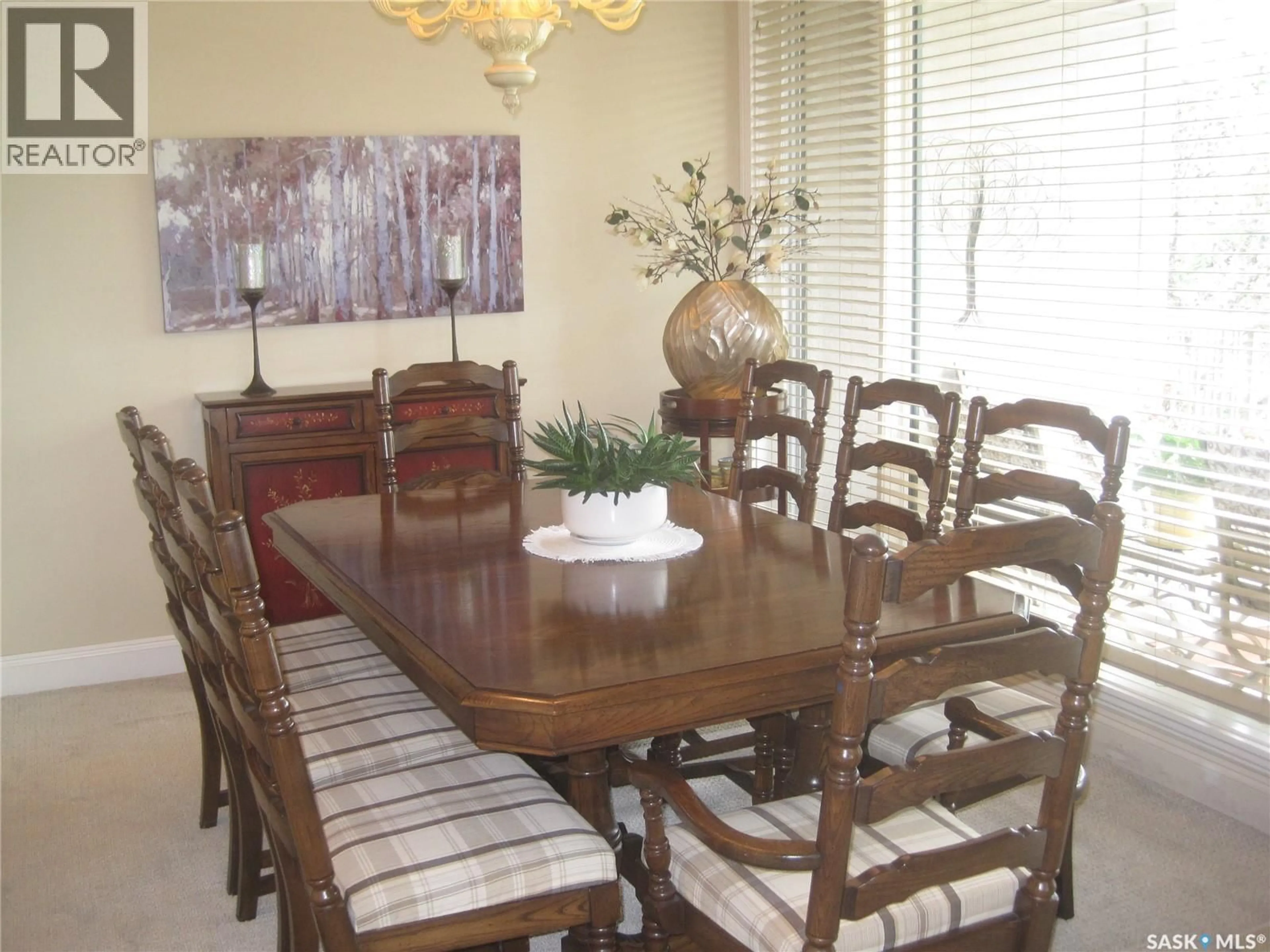 Dining room, wood/laminate floor for 240 3435 HILLSDALE STREET, Regina Saskatchewan S4S0A6