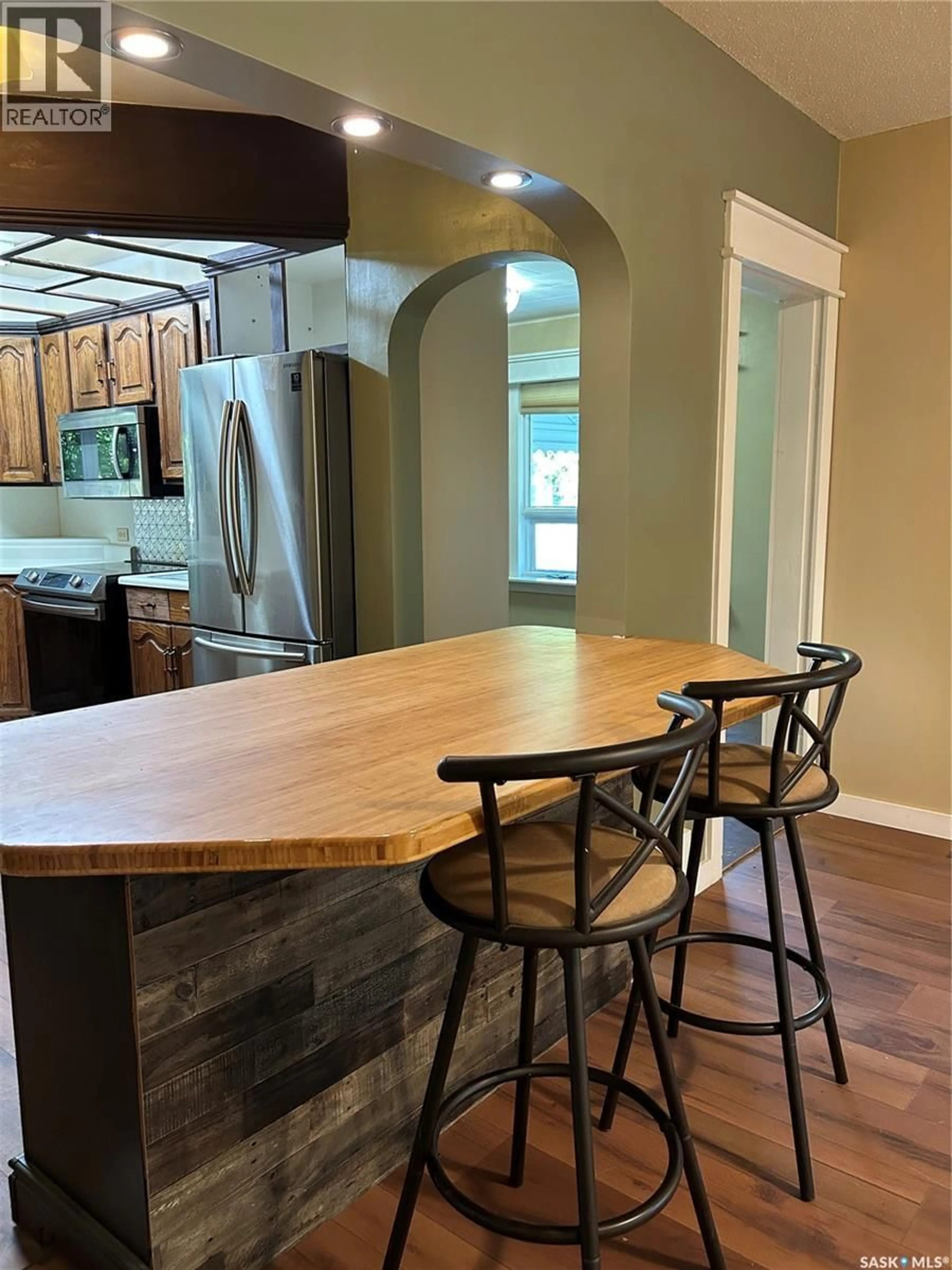 Open concept kitchen, wood/laminate floor for 346 WALNUT STREET, Porcupine Plain Saskatchewan S0E1H0