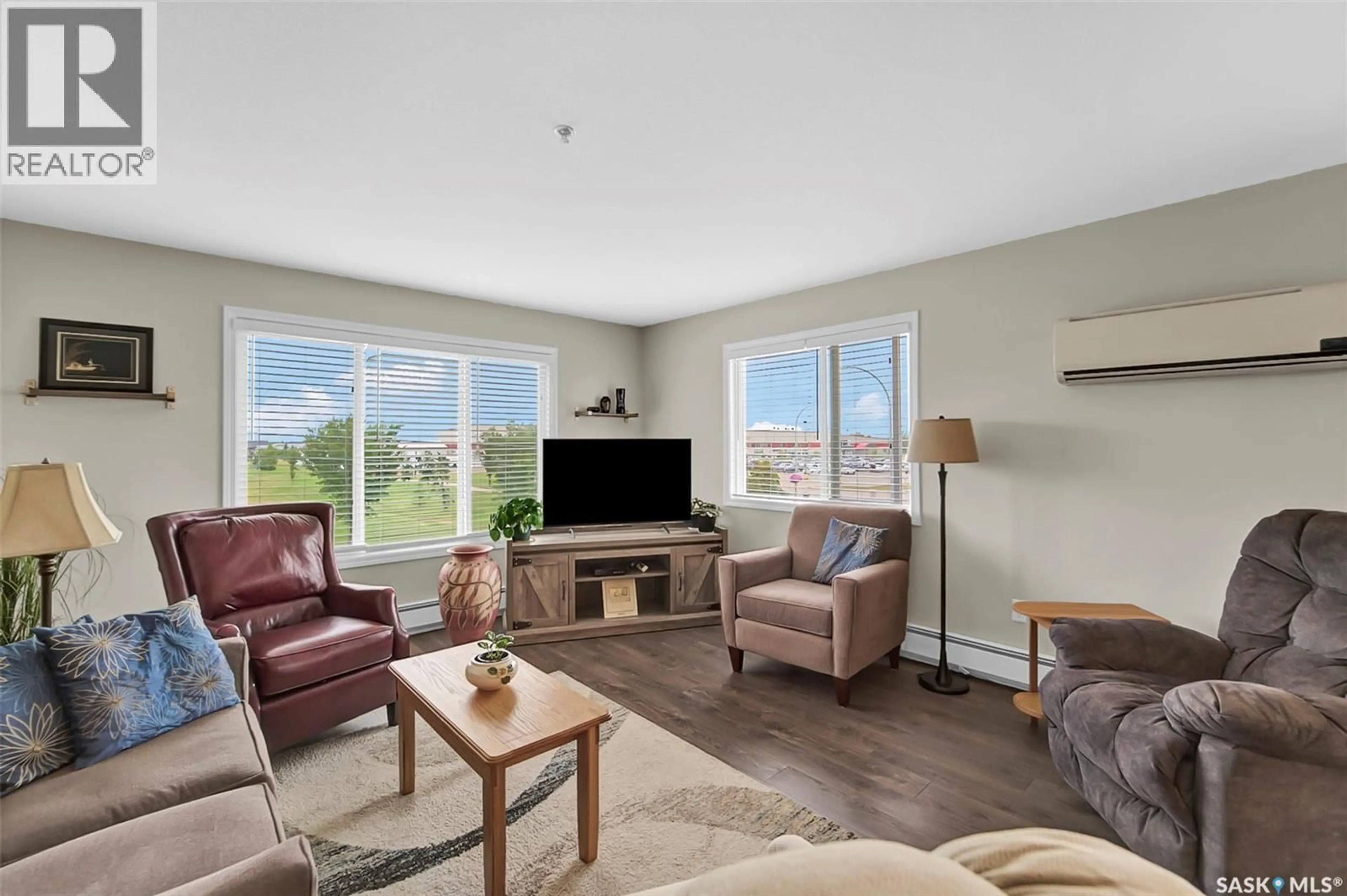 Living room with furniture, unknown for 202 610 CENTENNIAL BOULEVARD, Warman Saskatchewan S0K4S1