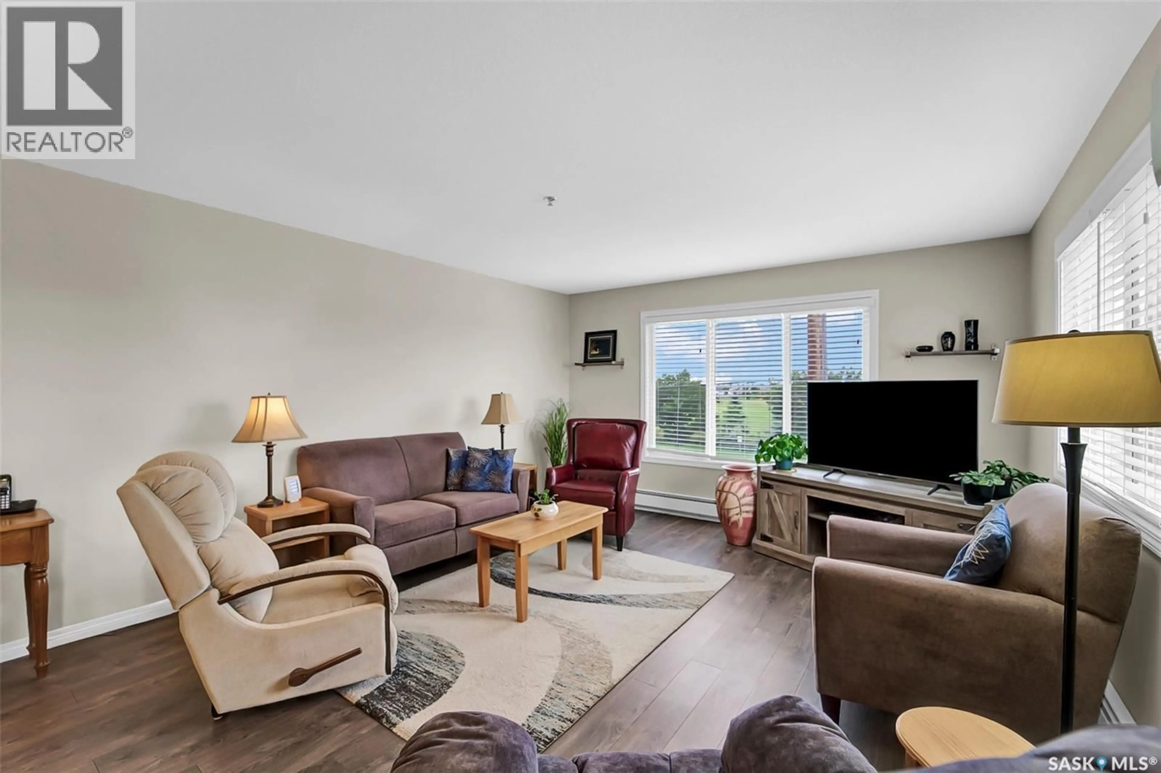 Living room with furniture, unknown for 202 610 CENTENNIAL BOULEVARD, Warman Saskatchewan S0K4S1
