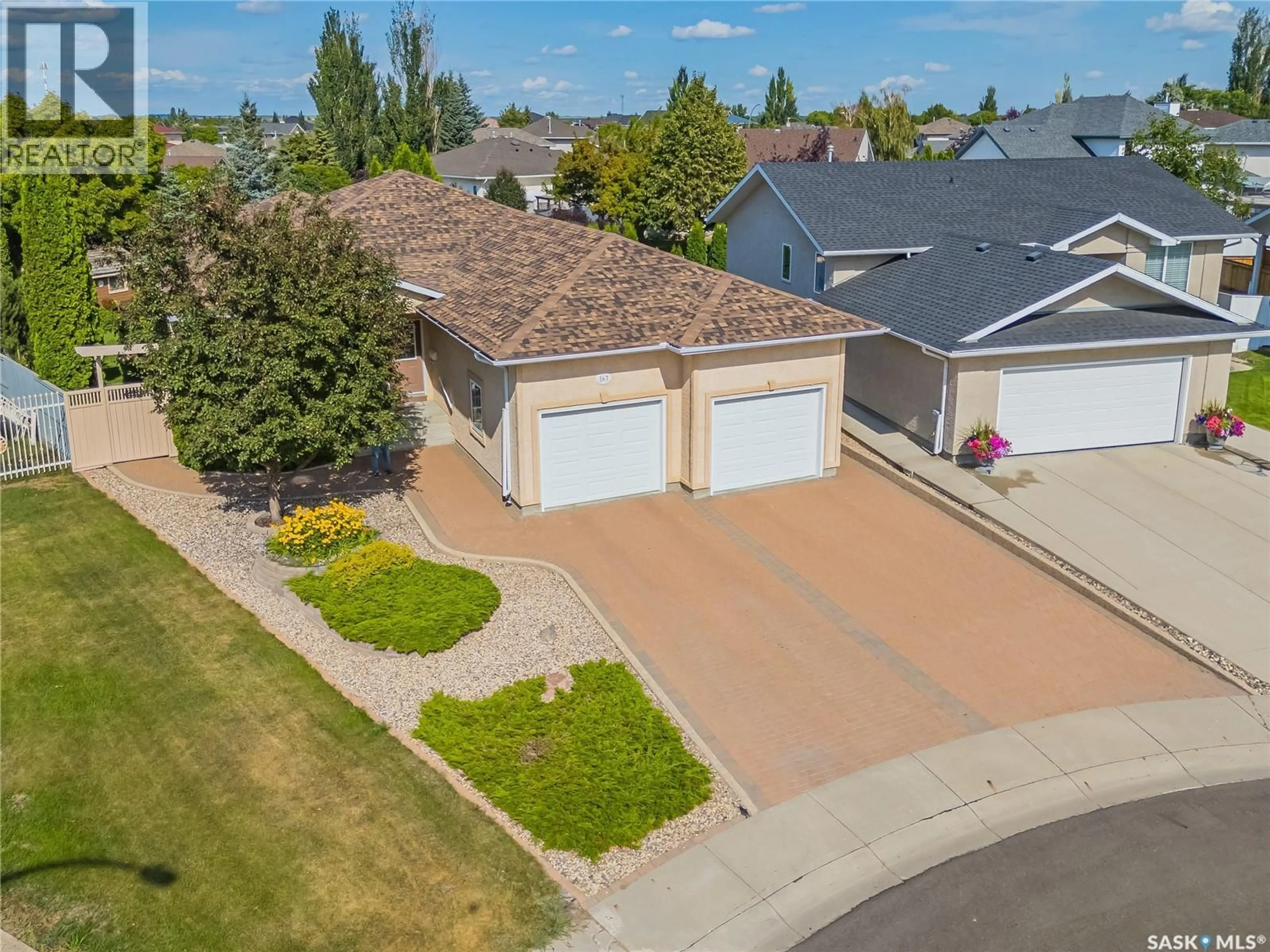 A pic from outside/outdoor area/front of a property/back of a property/a pic from drone, street for 163 BLACKBURN CRESCENT, Saskatoon Saskatchewan S7V1E7