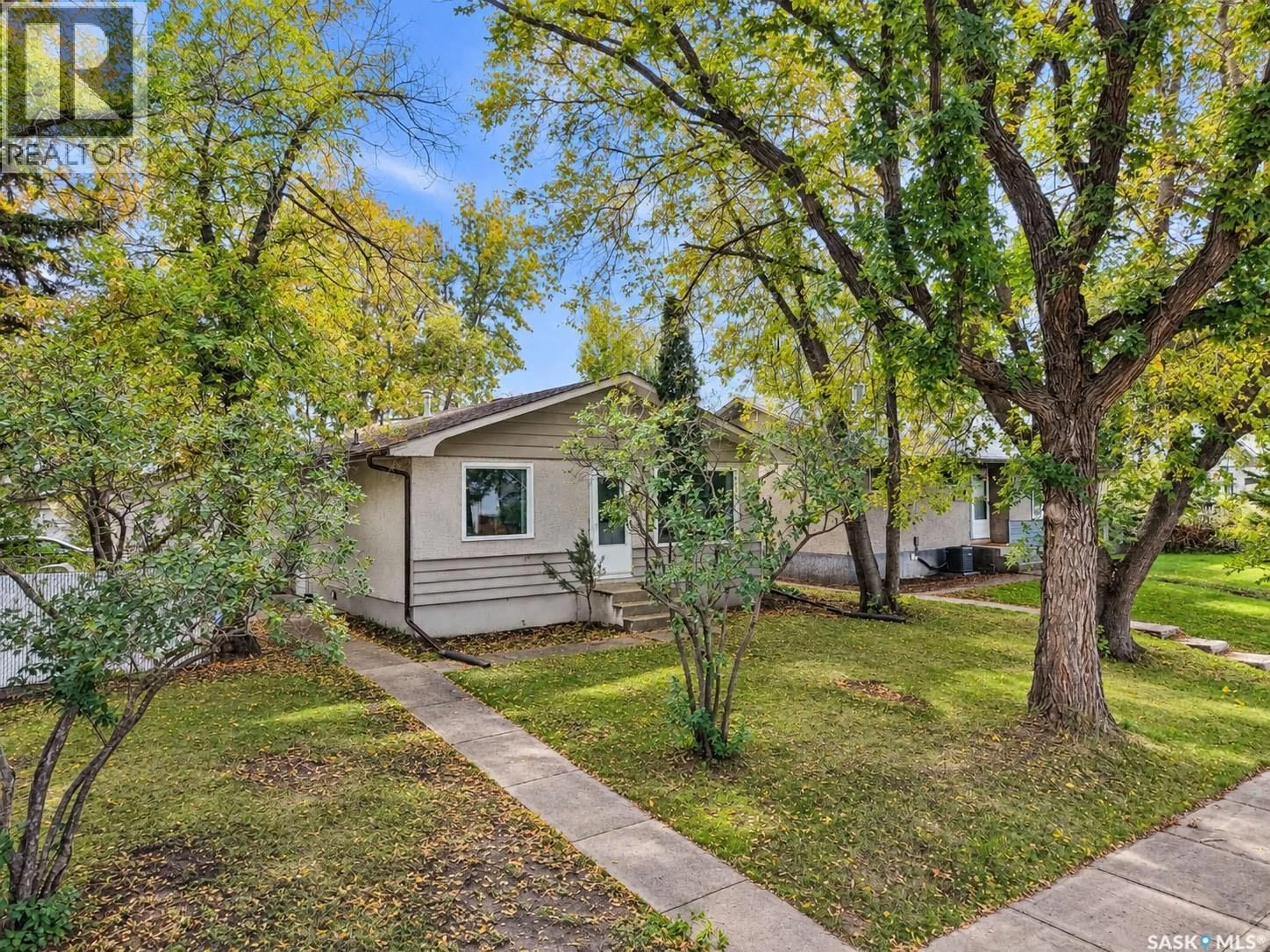 Home with vinyl exterior material, street for 1399 6TH STREET, Prince Albert Saskatchewan S6V0R1