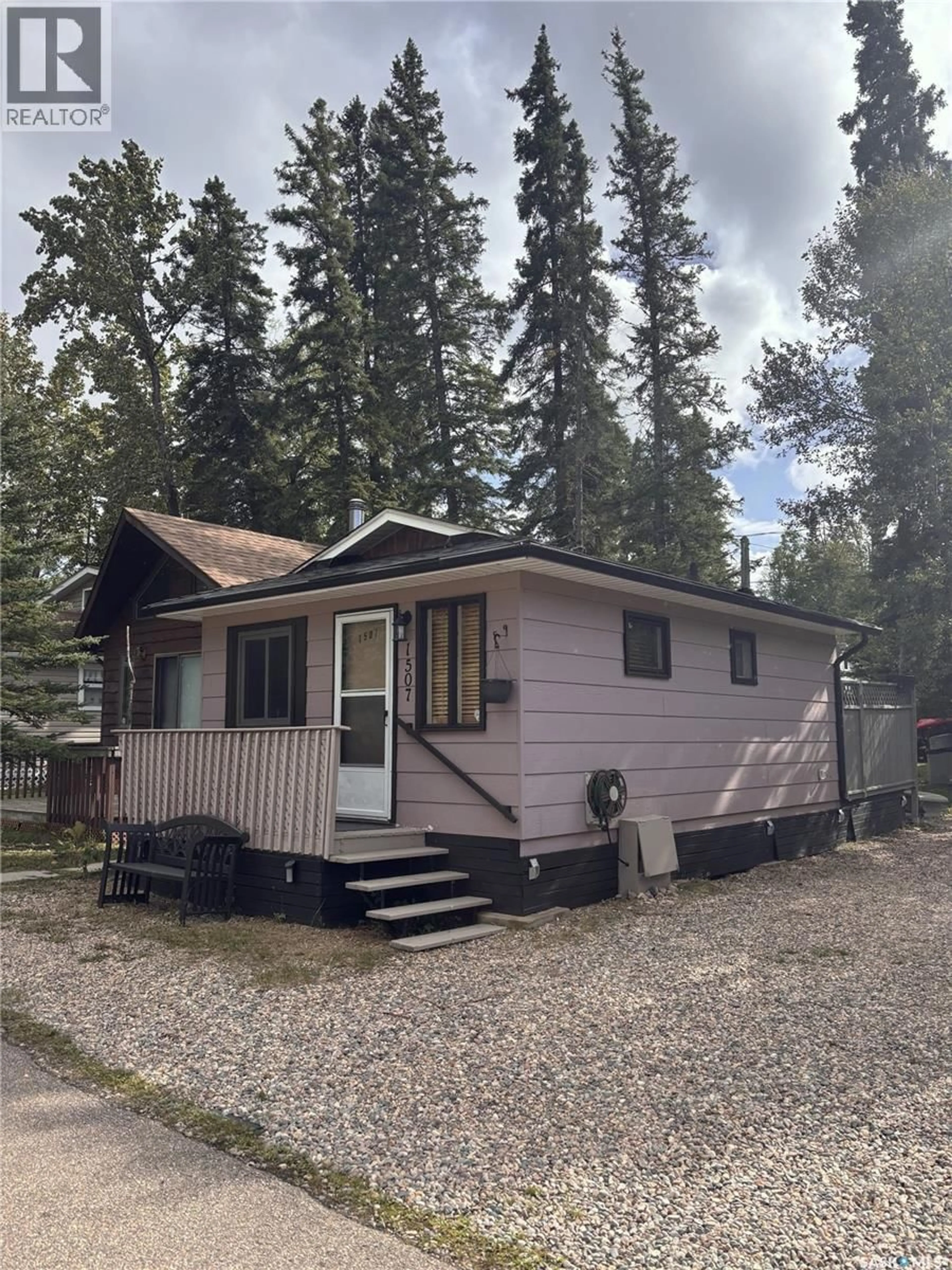 Home with vinyl exterior material, street for 1507 DOVE, Prince Albert National Park Saskatchewan S0J2Y0