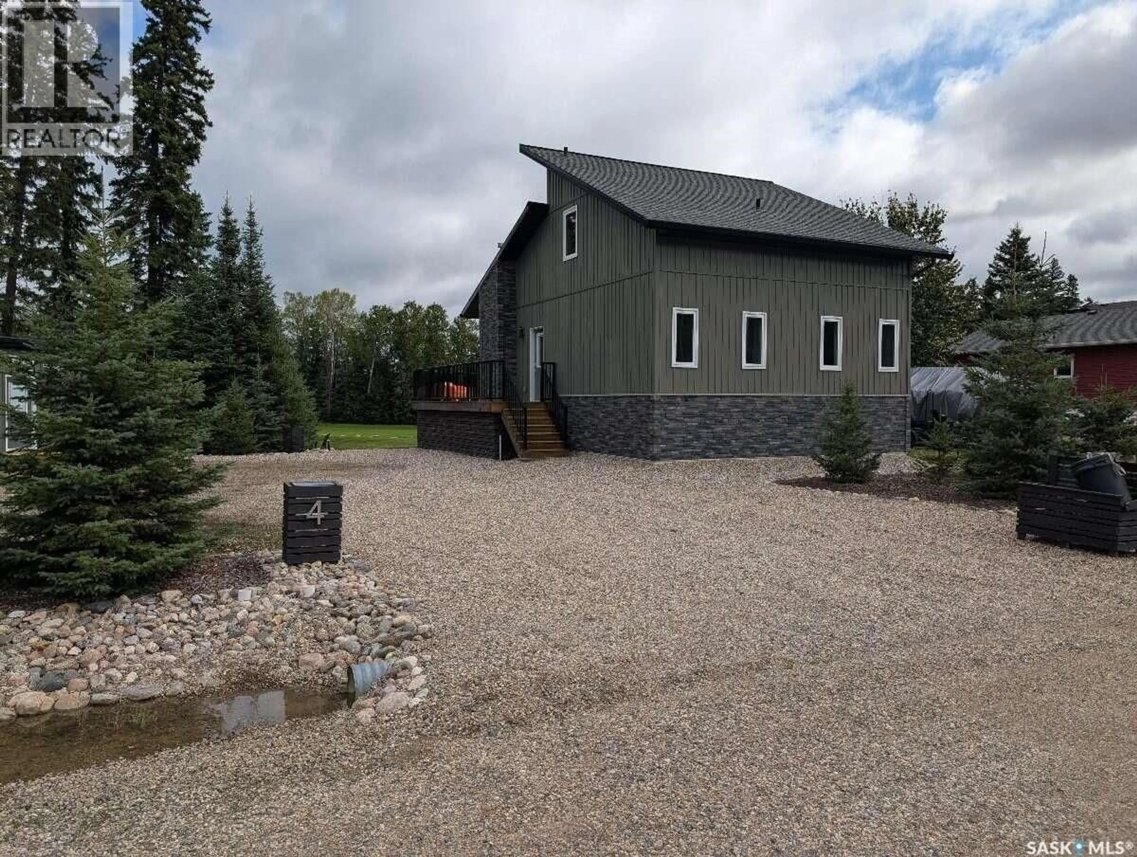 A pic from outside/outdoor area/front of a property/back of a property/a pic from drone, mountain view for 4 BERSCHEID BAY, Candle Lake Saskatchewan S0J3E0