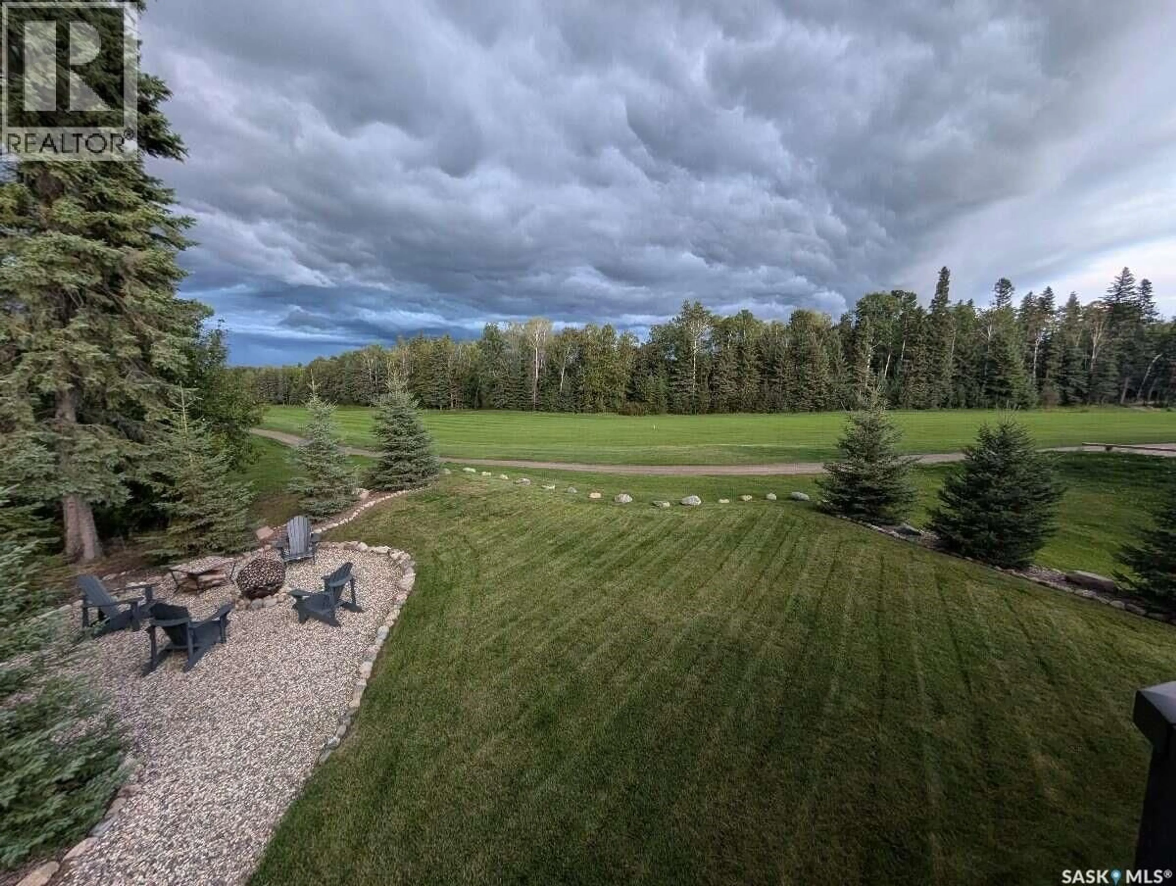 A pic from outside/outdoor area/front of a property/back of a property/a pic from drone, forest/trees view for 4 BERSCHEID BAY, Candle Lake Saskatchewan S0J3E0