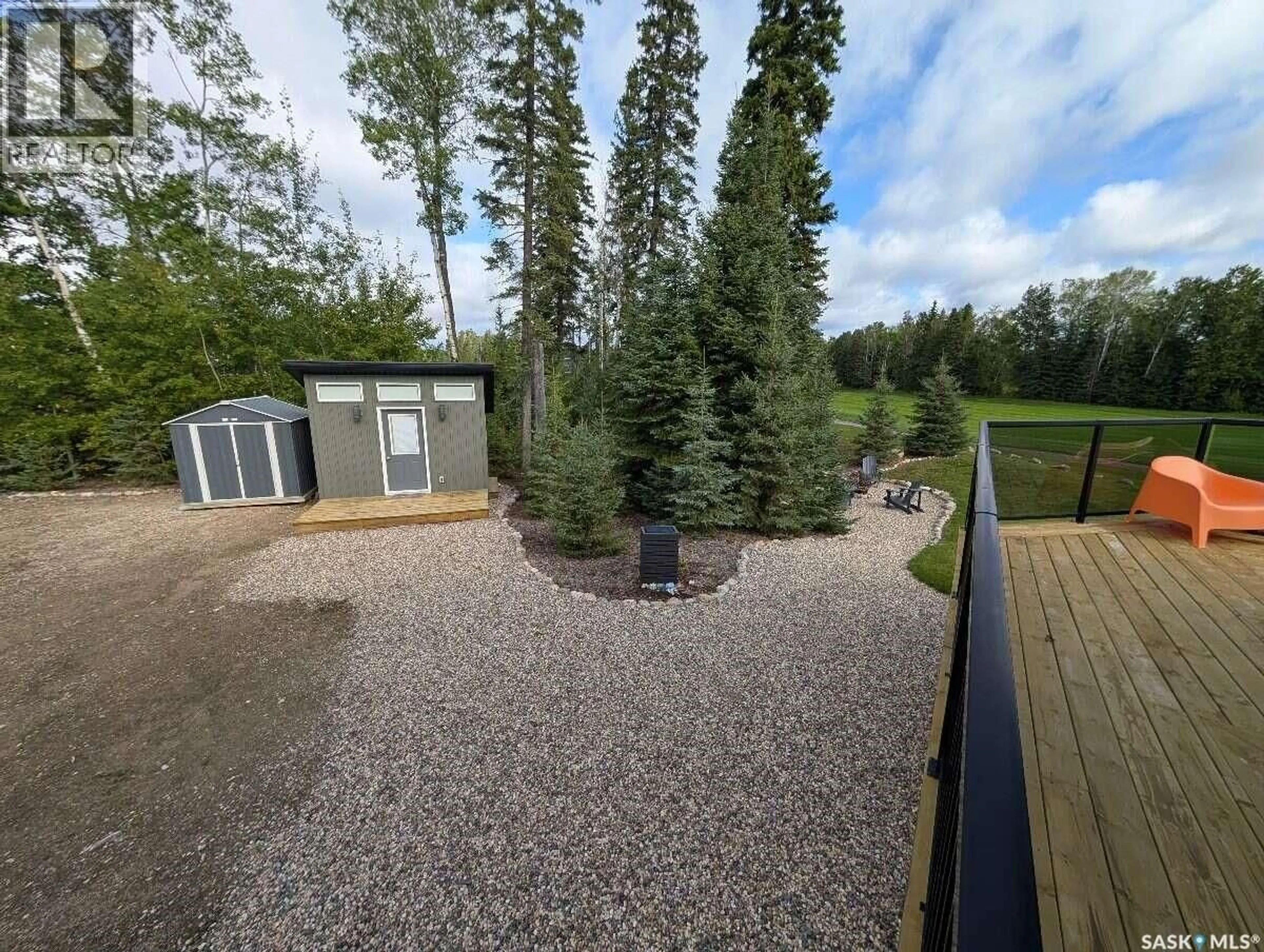 A pic from outside/outdoor area/front of a property/back of a property/a pic from drone, forest/trees view for 4 BERSCHEID BAY, Candle Lake Saskatchewan S0J3E0