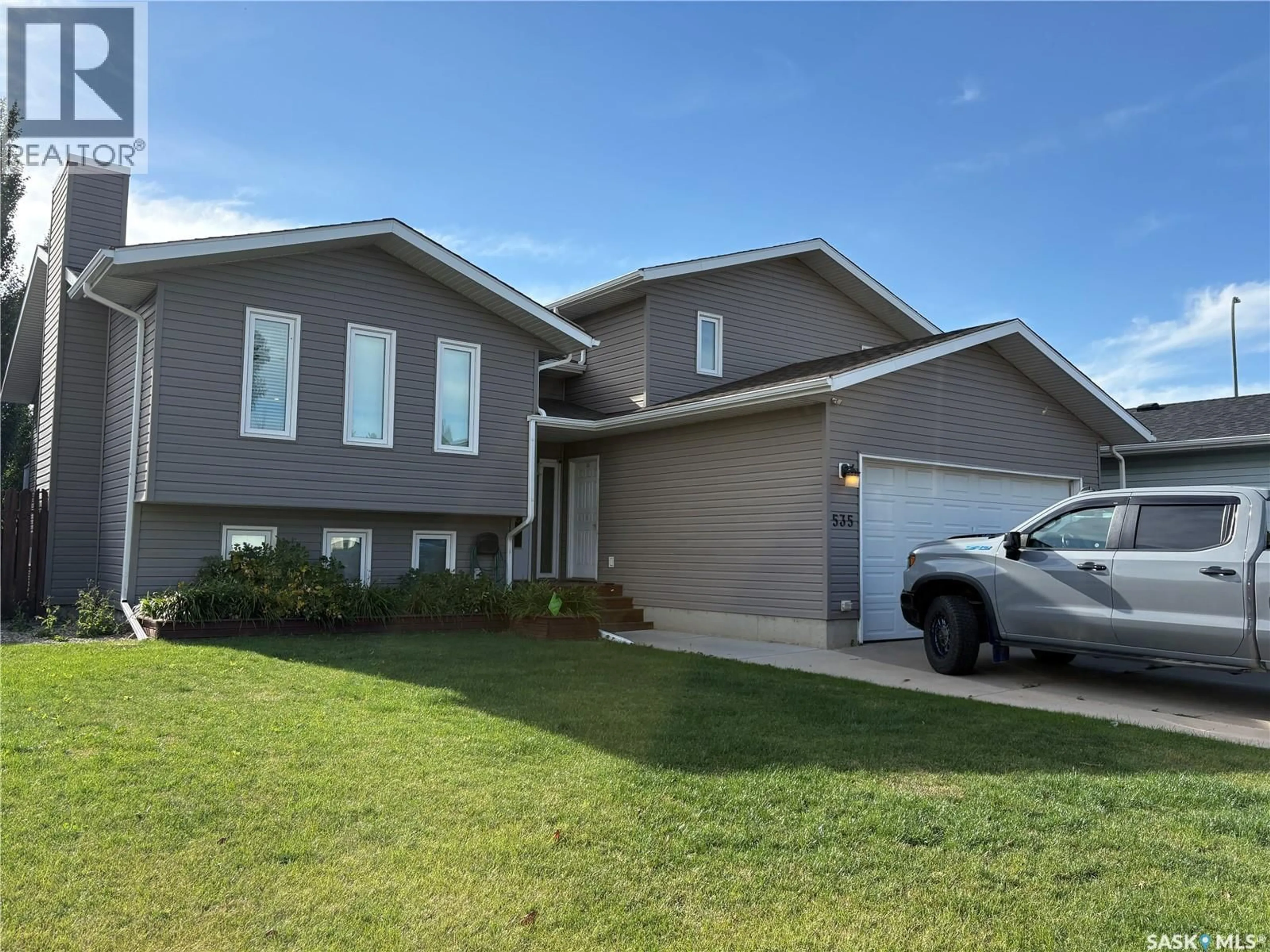 Home with vinyl exterior material, street for 535 LALOCHE ROAD, Saskatoon Saskatchewan S7K5G1