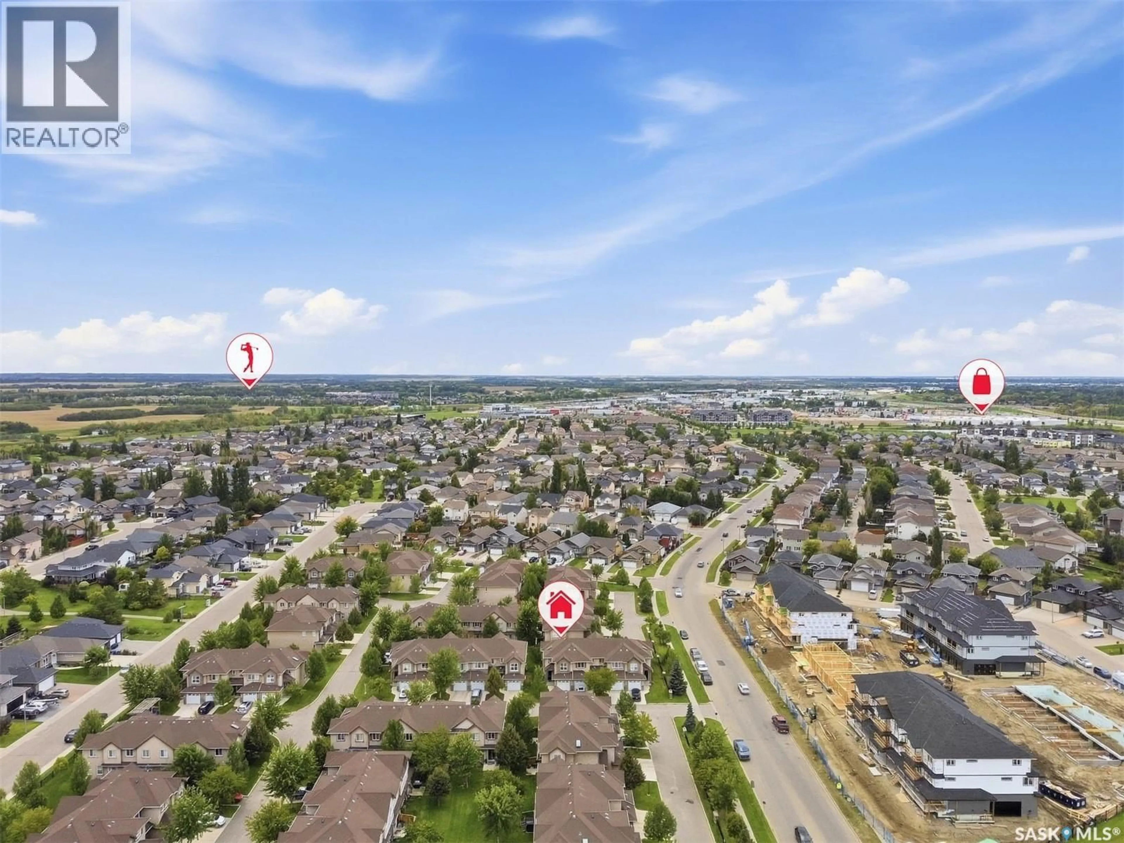 A pic from outside/outdoor area/front of a property/back of a property/a pic from drone, street for 710 - 606 GORDON ROAD, Saskatoon Saskatchewan S7T0J6