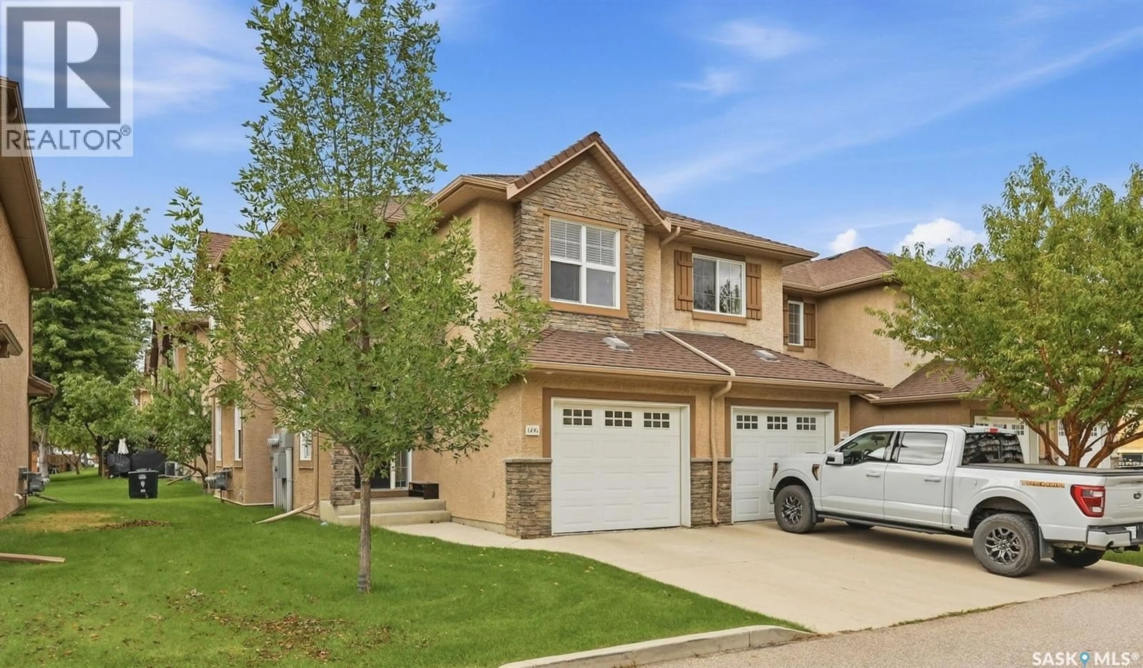 Home with brick exterior material, street for 710 - 606 GORDON ROAD, Saskatoon Saskatchewan S7T0J6