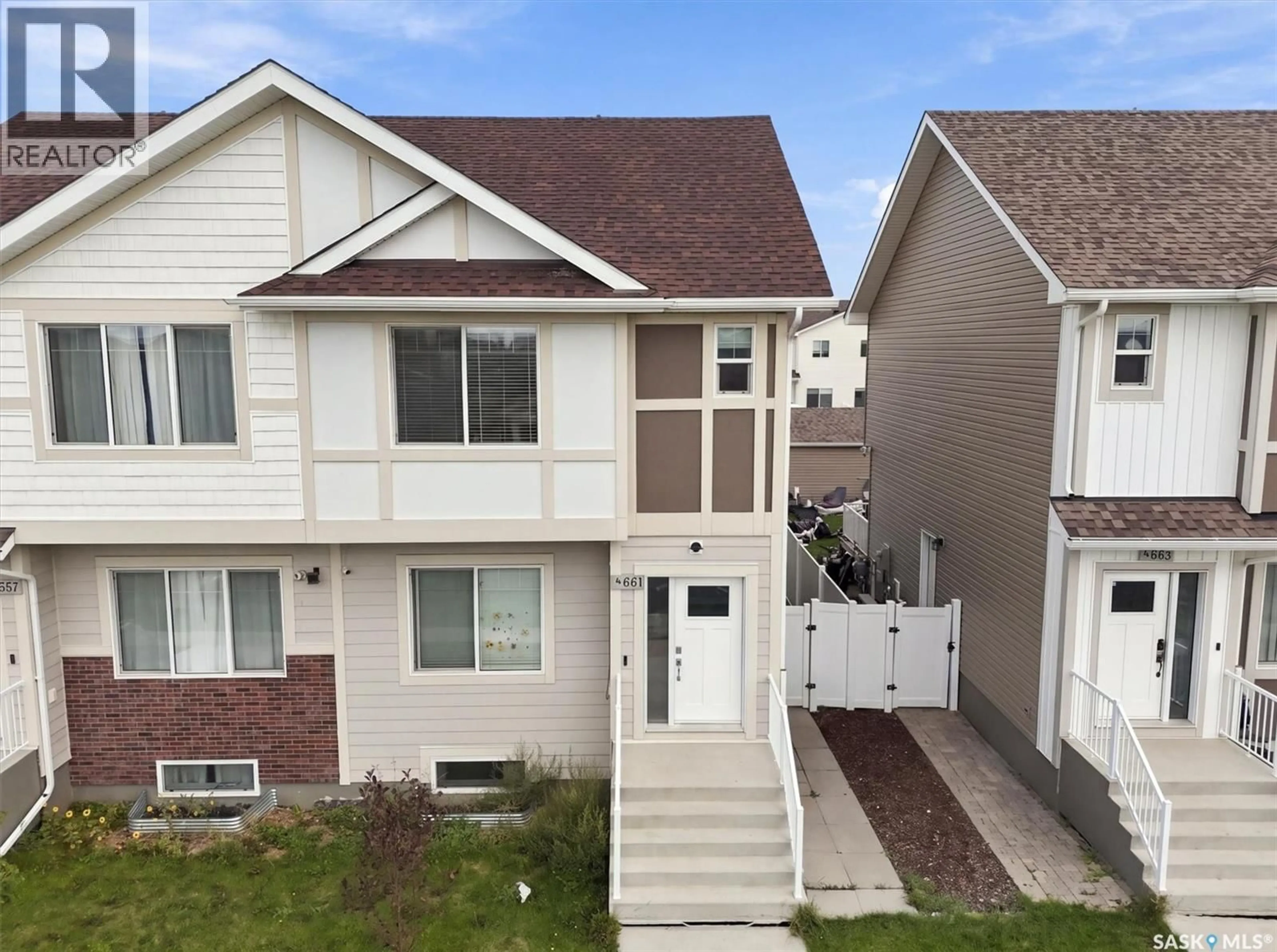 Home with vinyl exterior material, street for 661 FEHEREGYHAZI BOULEVARD, Saskatoon Saskatchewan S7W0Z4