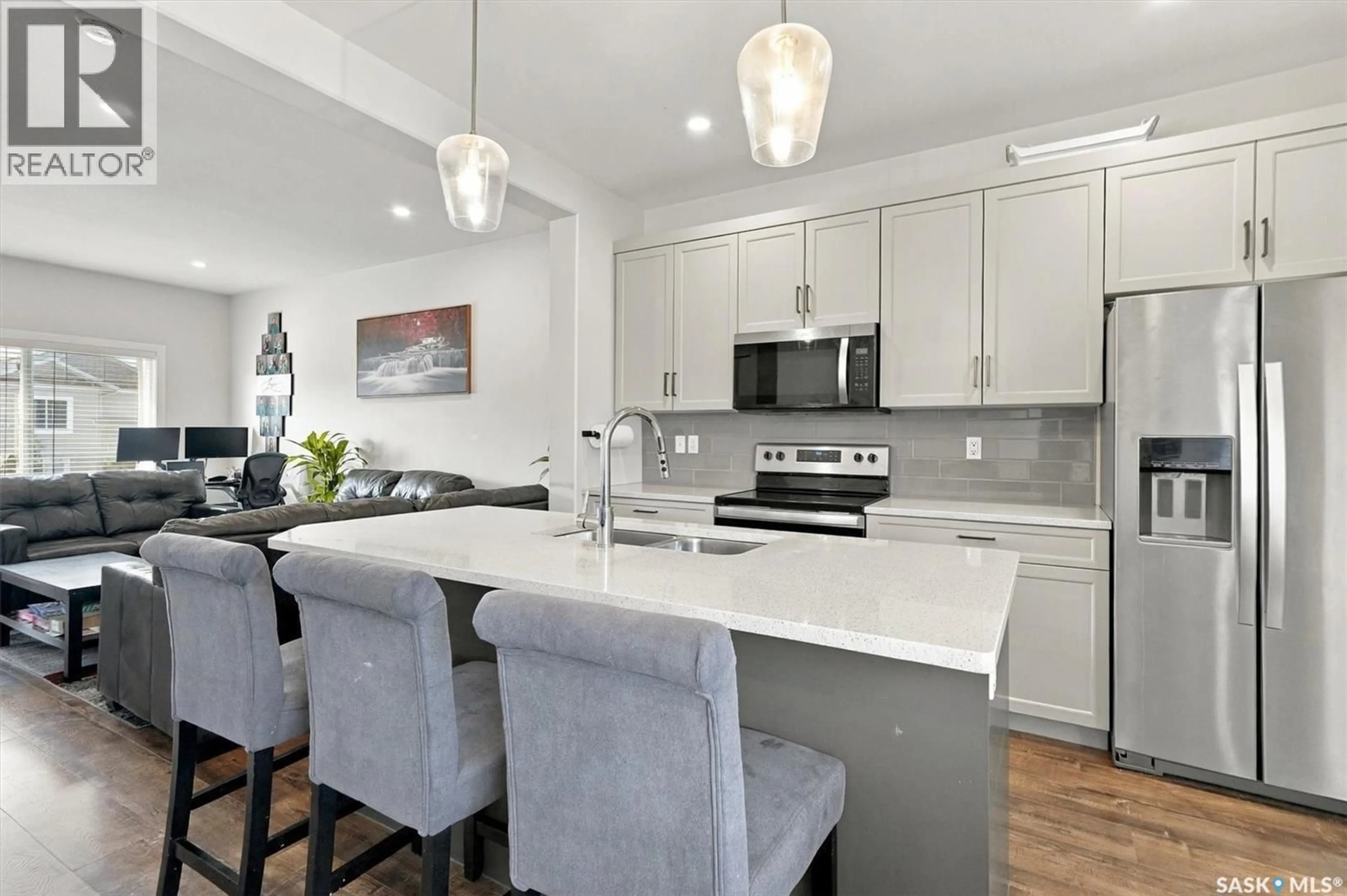 Open concept kitchen, ceramic/tile floor for 661 FEHEREGYHAZI BOULEVARD, Saskatoon Saskatchewan S7W0Z4