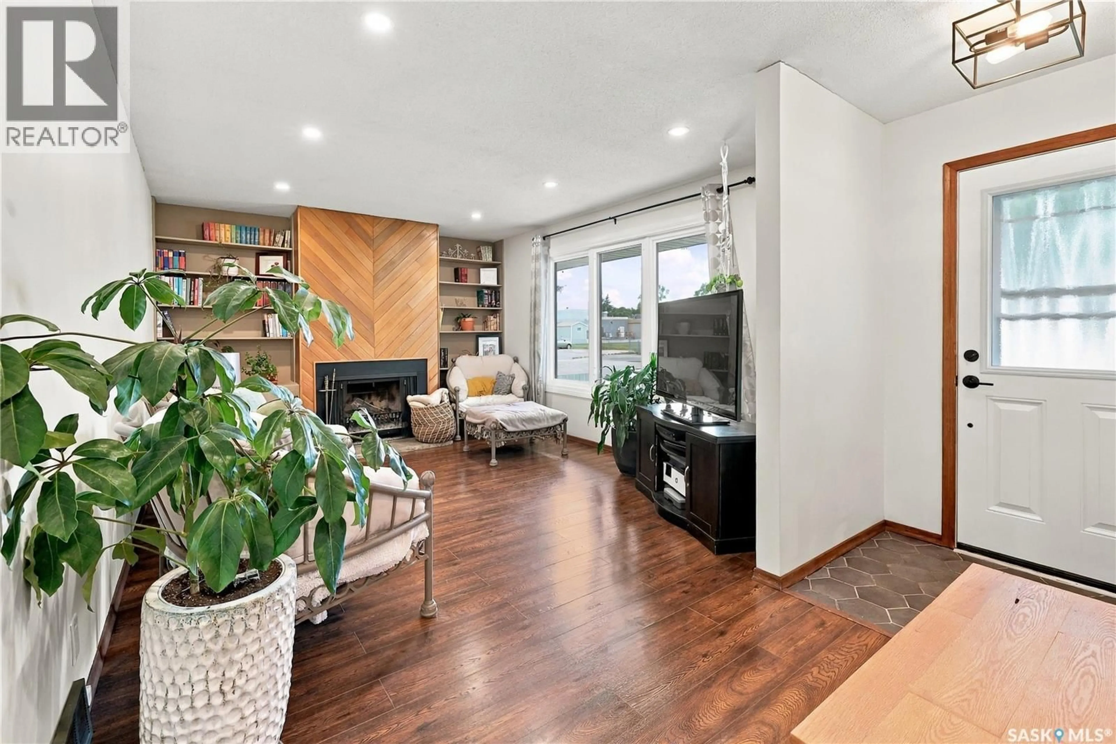 Living room with furniture, wood/laminate floor for 195 WELLS STREET, Regina Saskatchewan S4R5Z6