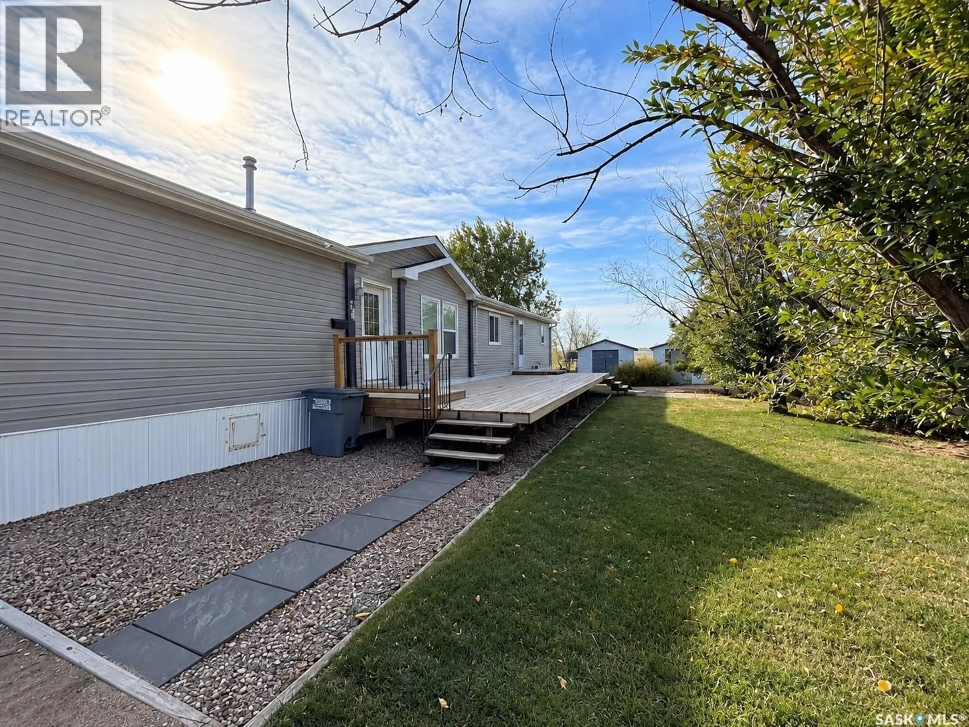 A pic from outside/outdoor area/front of a property/back of a property/a pic from drone, street for 70A PRAIRIE SUN COURT, Swift Current Saskatchewan S9H3X6