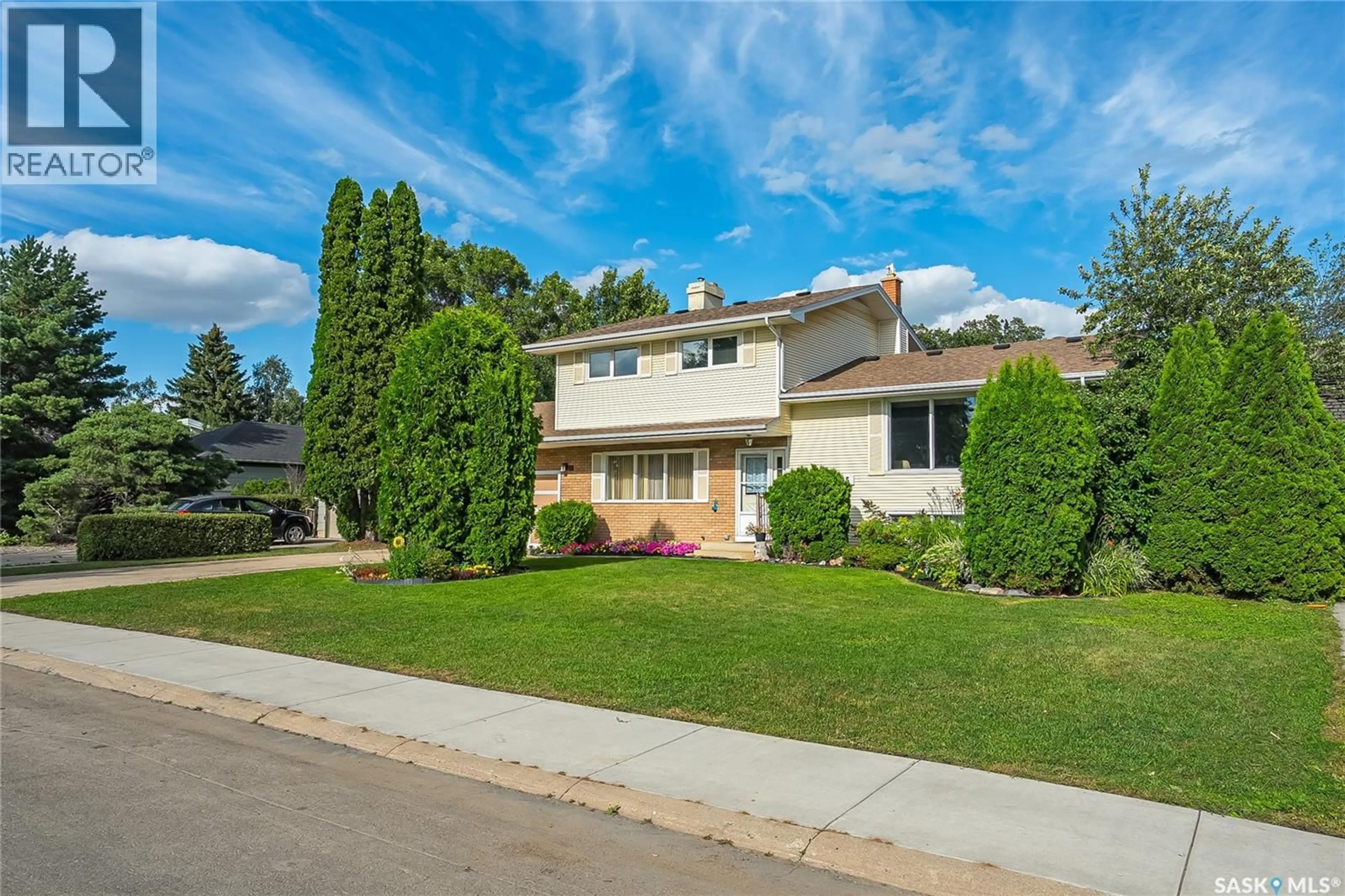 Home with vinyl exterior material, street for 15 HARVARD CRESCENT, Saskatoon Saskatchewan S7H3R2