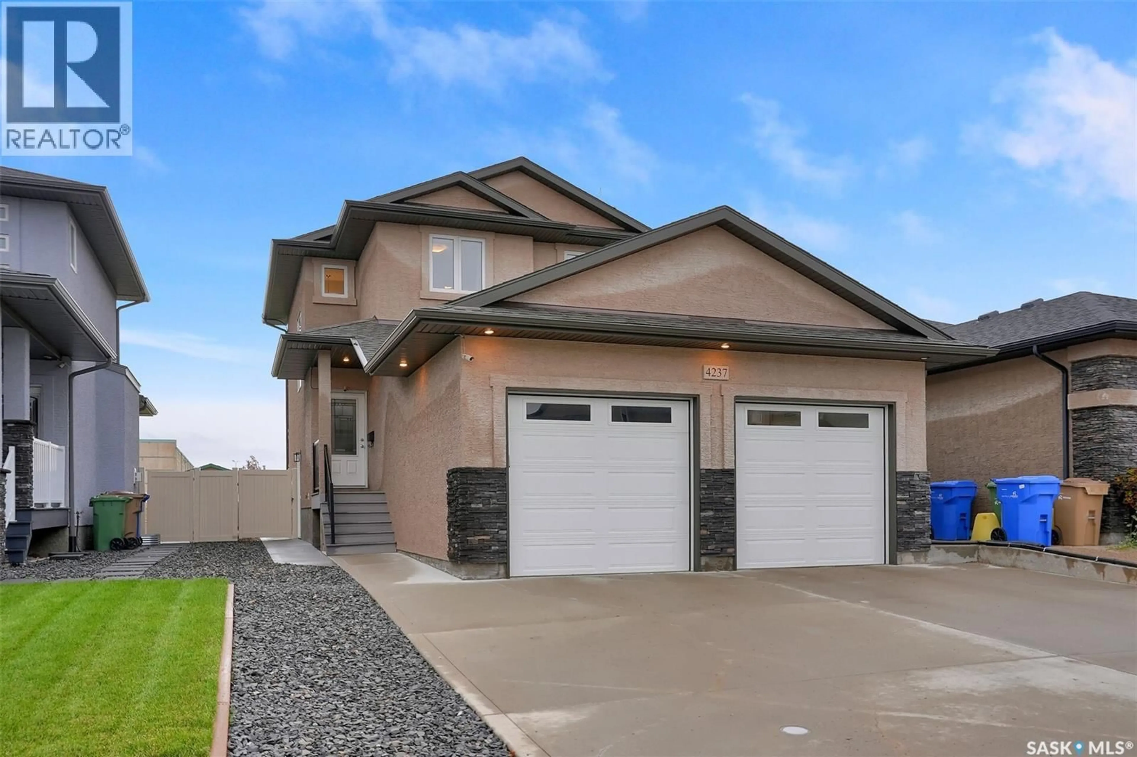 Home with vinyl exterior material, street for E - 4237 GREEN OLIVE WAY, Regina Saskatchewan S4V1P9