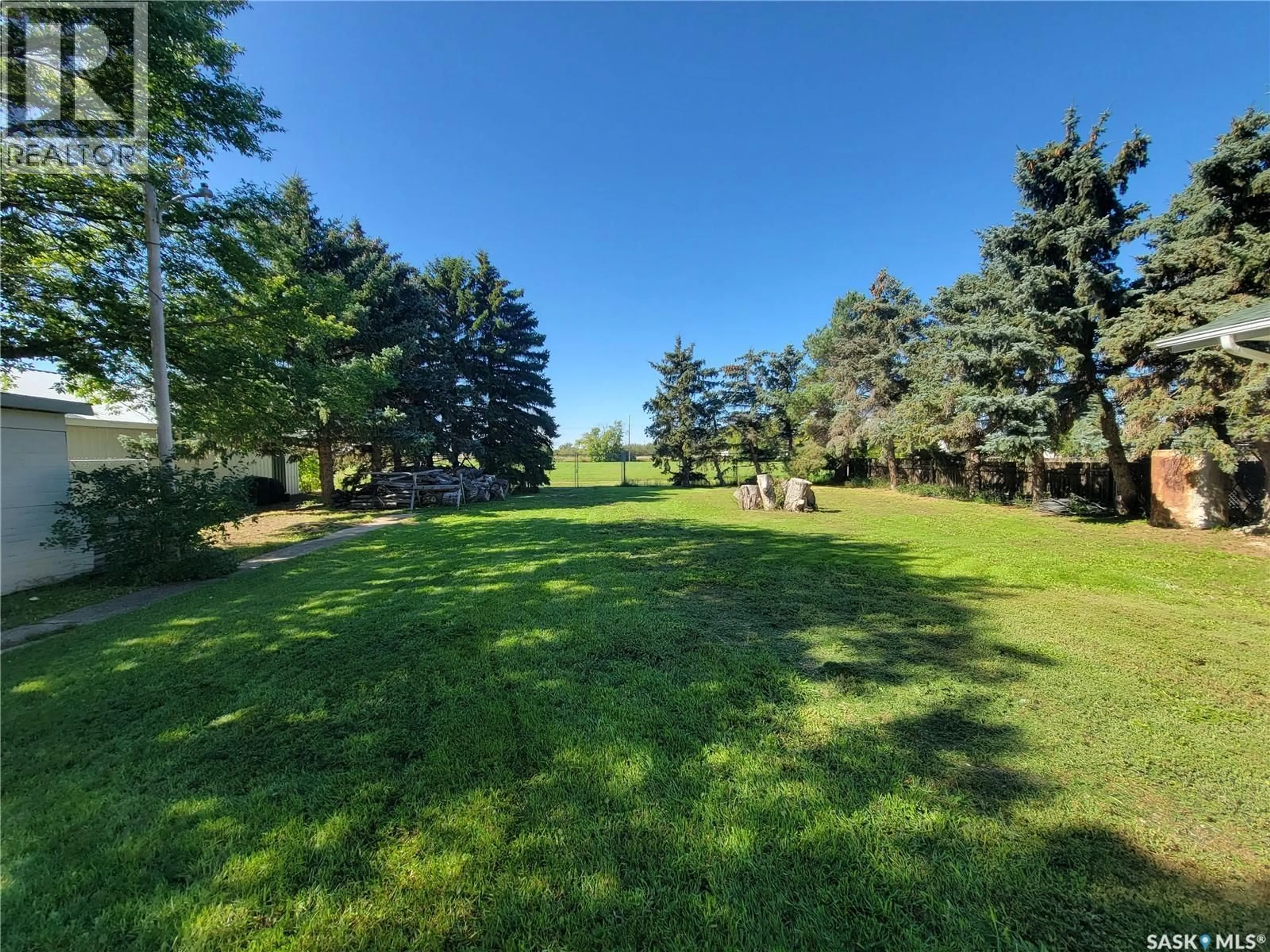 A pic from outside/outdoor area/front of a property/back of a property/a pic from drone, forest/trees view for 200 & 202 SASKATCHEWAN AVENUE, Tramping Lake Saskatchewan S0K4H0