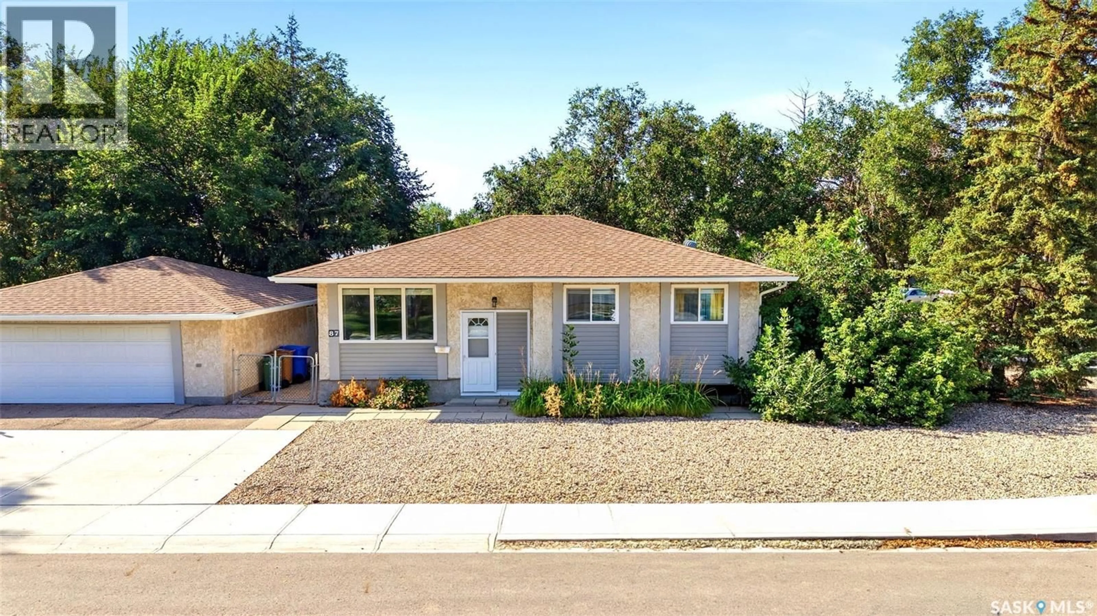 Home with brick exterior material, street for 87 VERNON CRESCENT, Regina Saskatchewan S4R7S8
