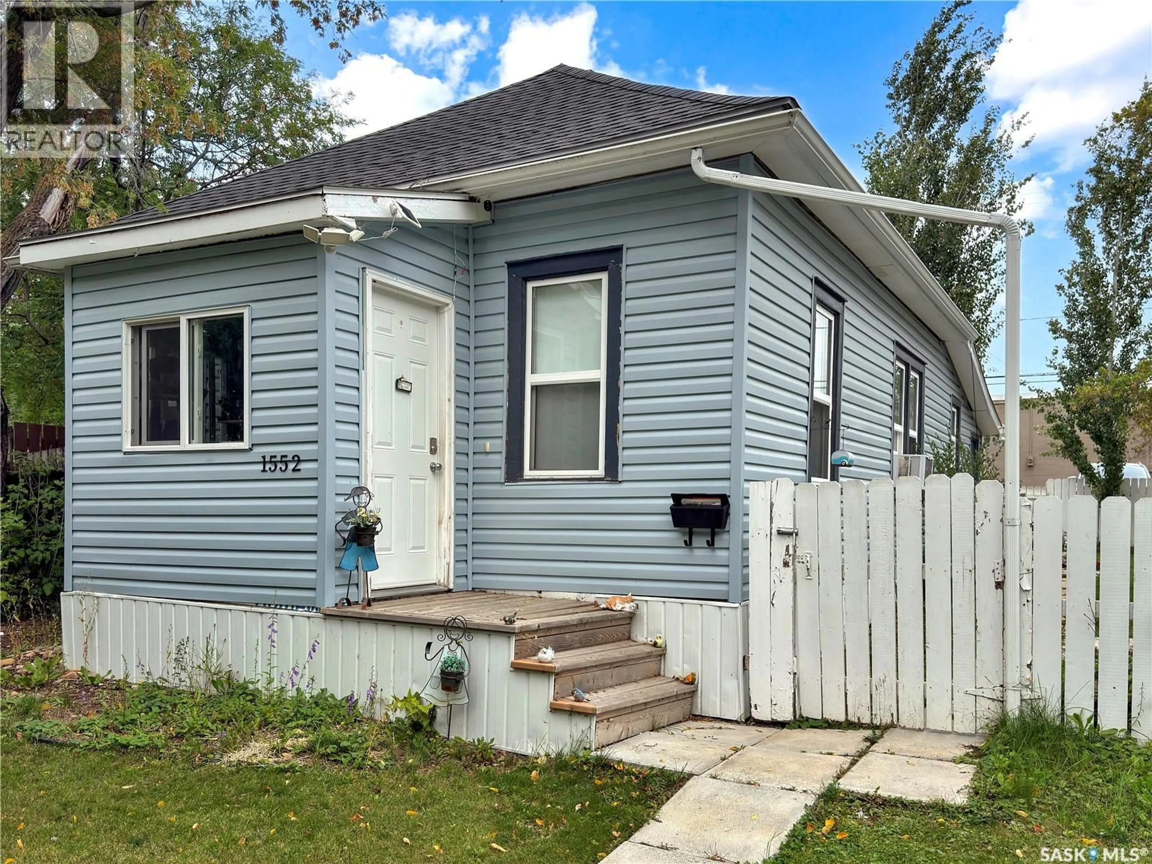 Home with vinyl exterior material, street for 1552 99TH STREET, North Battleford Saskatchewan S9A0R3