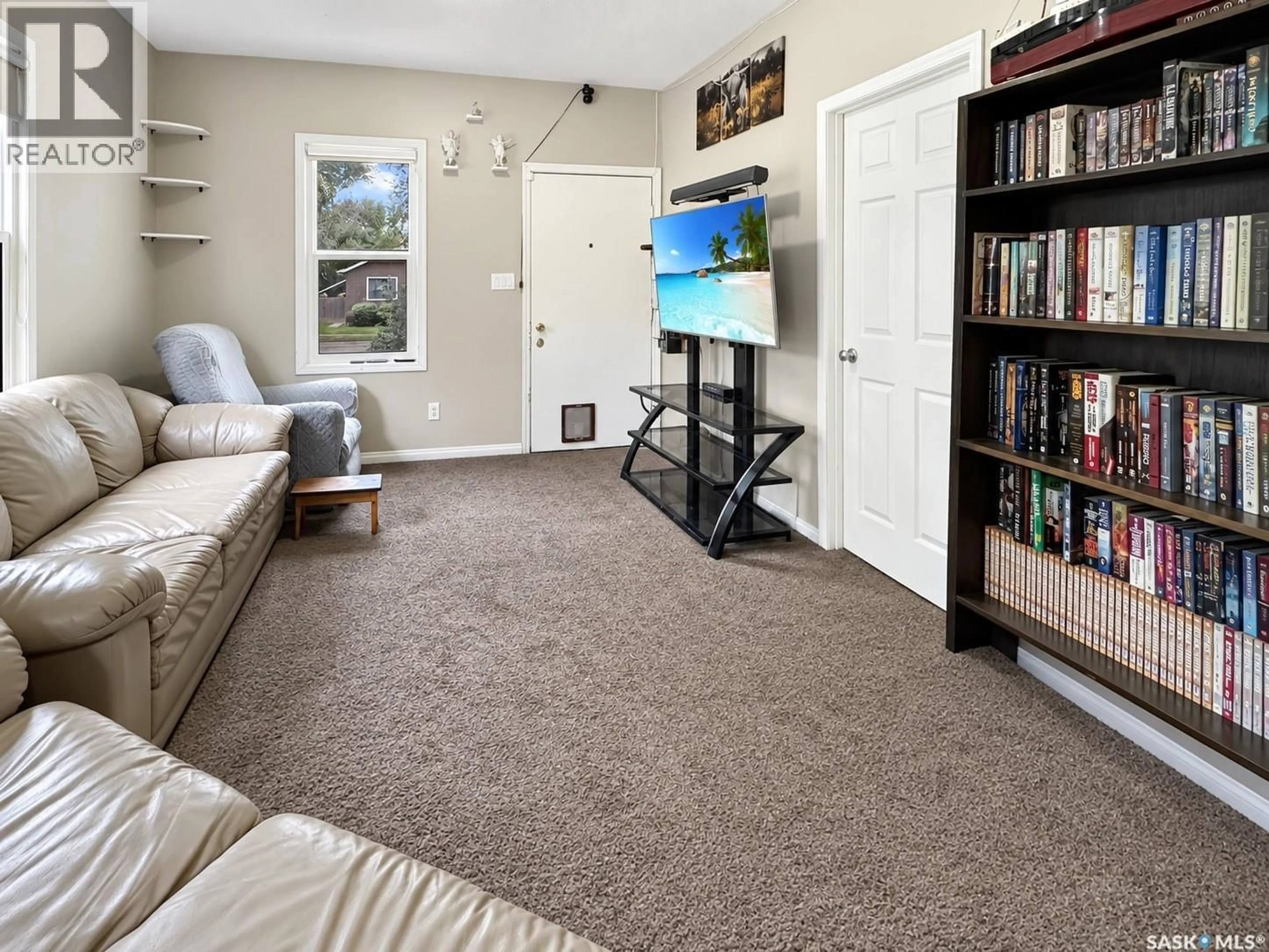 Living room with furniture, carpet floor for 1552 99TH STREET, North Battleford Saskatchewan S9A0R3
