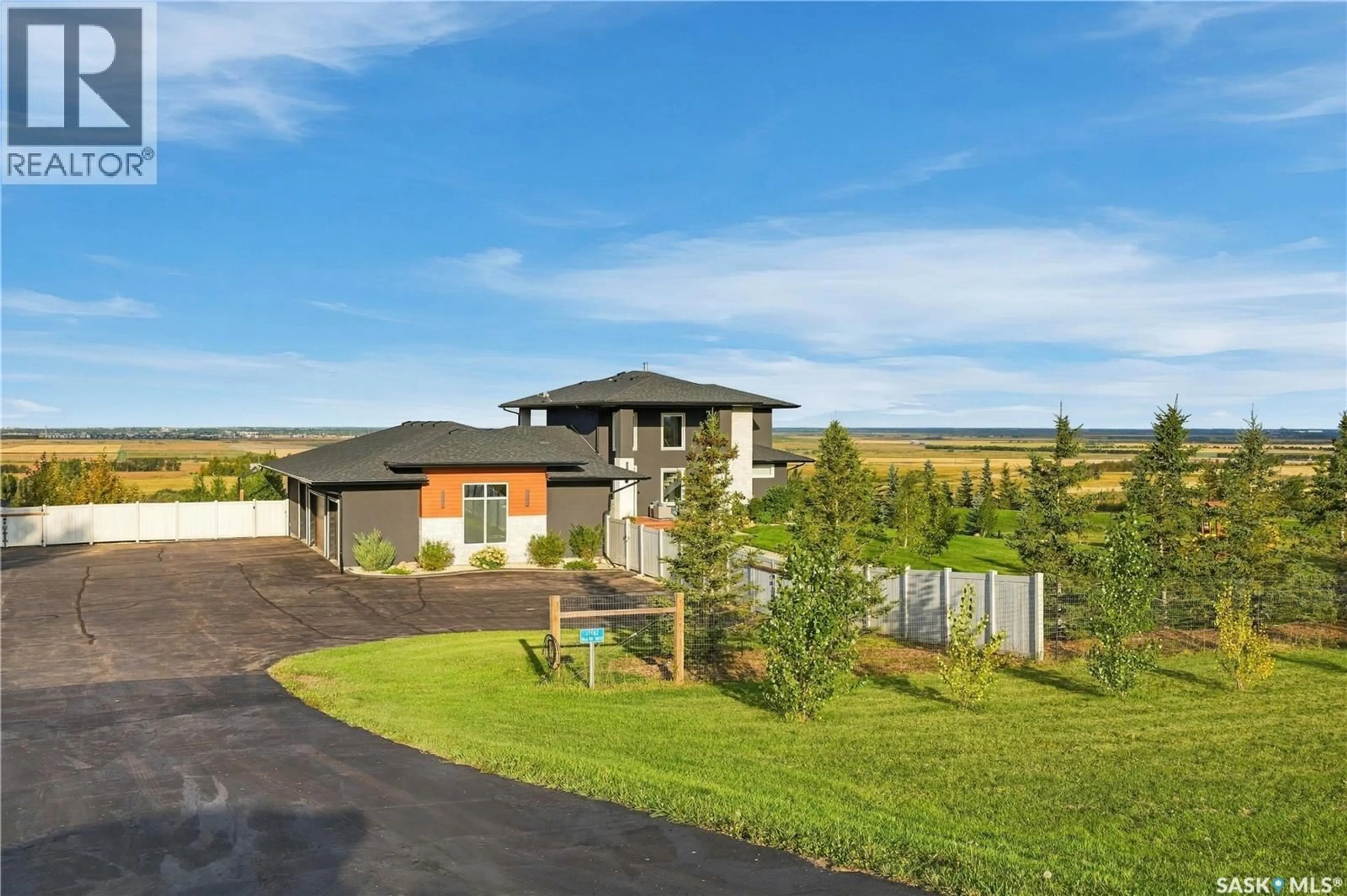 A pic from outside/outdoor area/front of a property/back of a property/a pic from drone, mountain view for 37142 EAGLE RIDGE, Corman Park Rm No. 344 Saskatchewan S7K2L6
