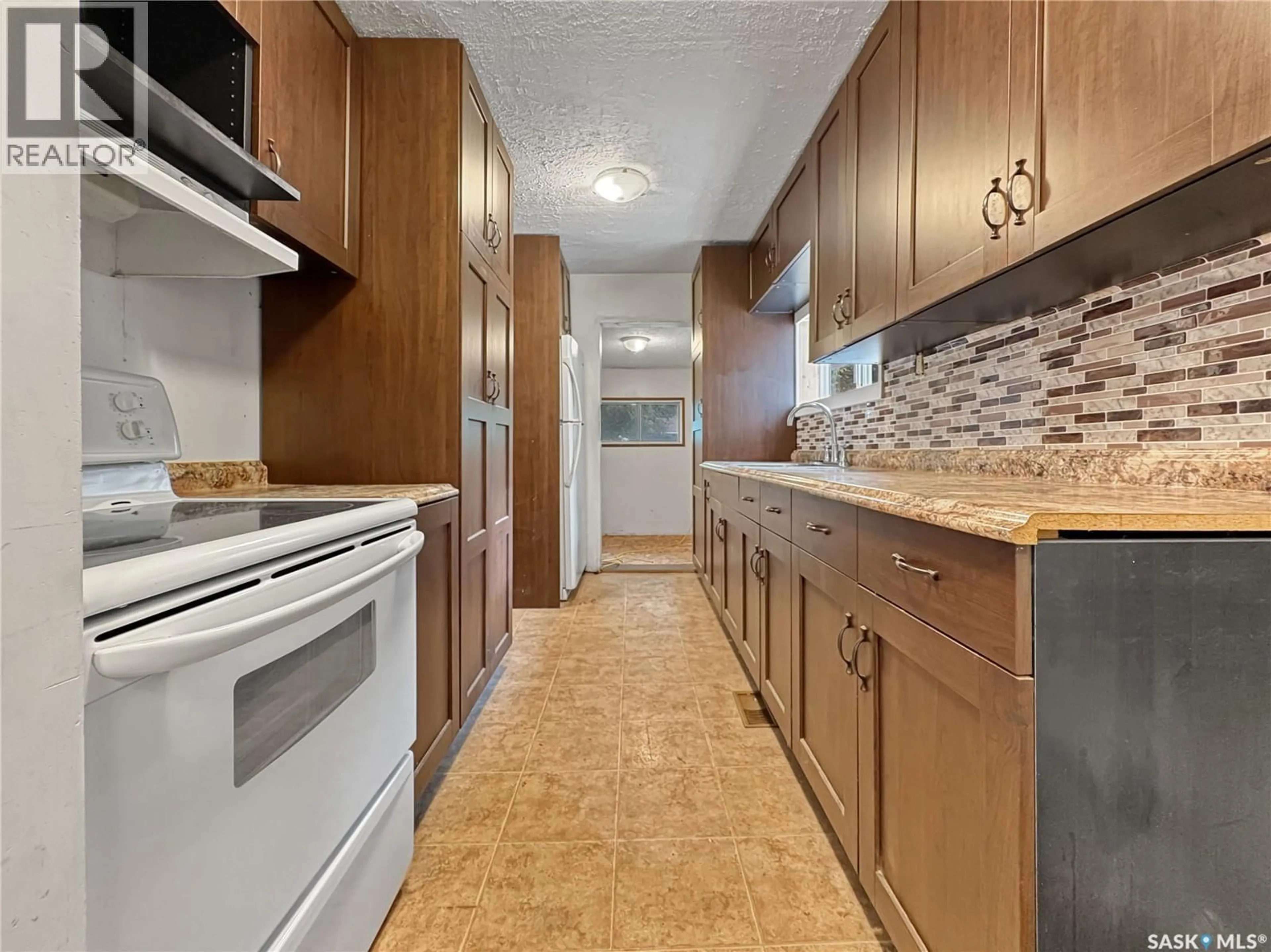 Standard kitchen, ceramic/tile floor for 112 MAIN STREET, Harris Saskatchewan S0L1K0