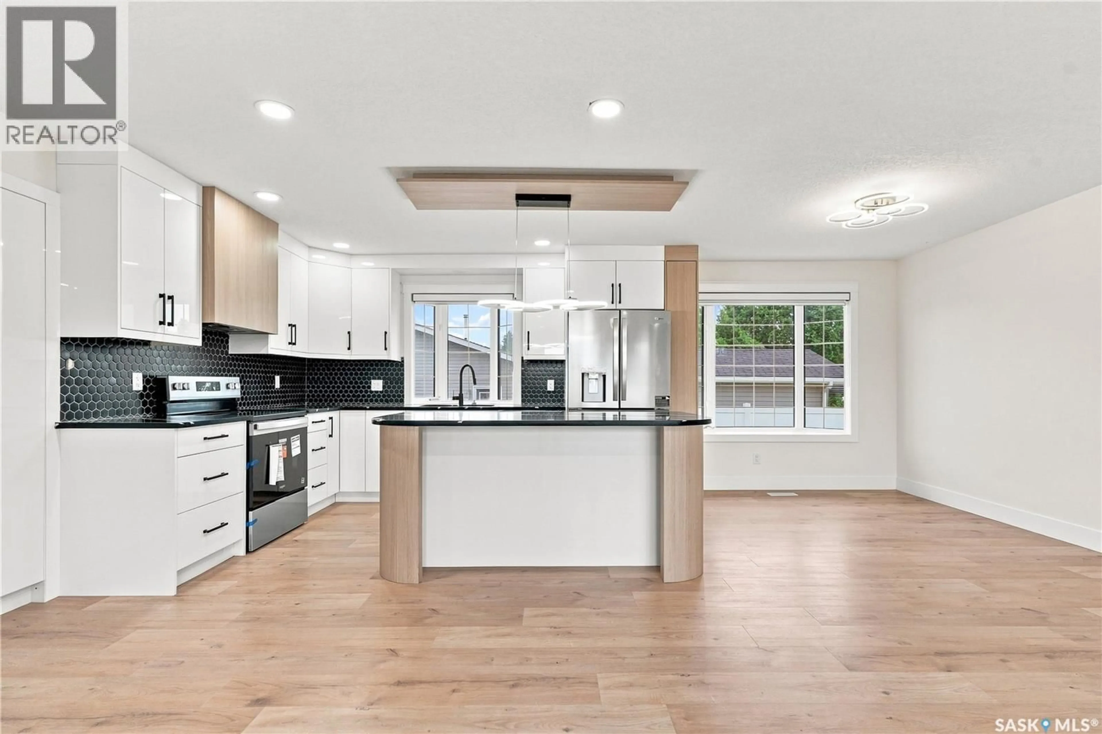 Open concept kitchen, unknown for 702 MCKERCHER DRIVE, Saskatoon Saskatchewan S7H3W7