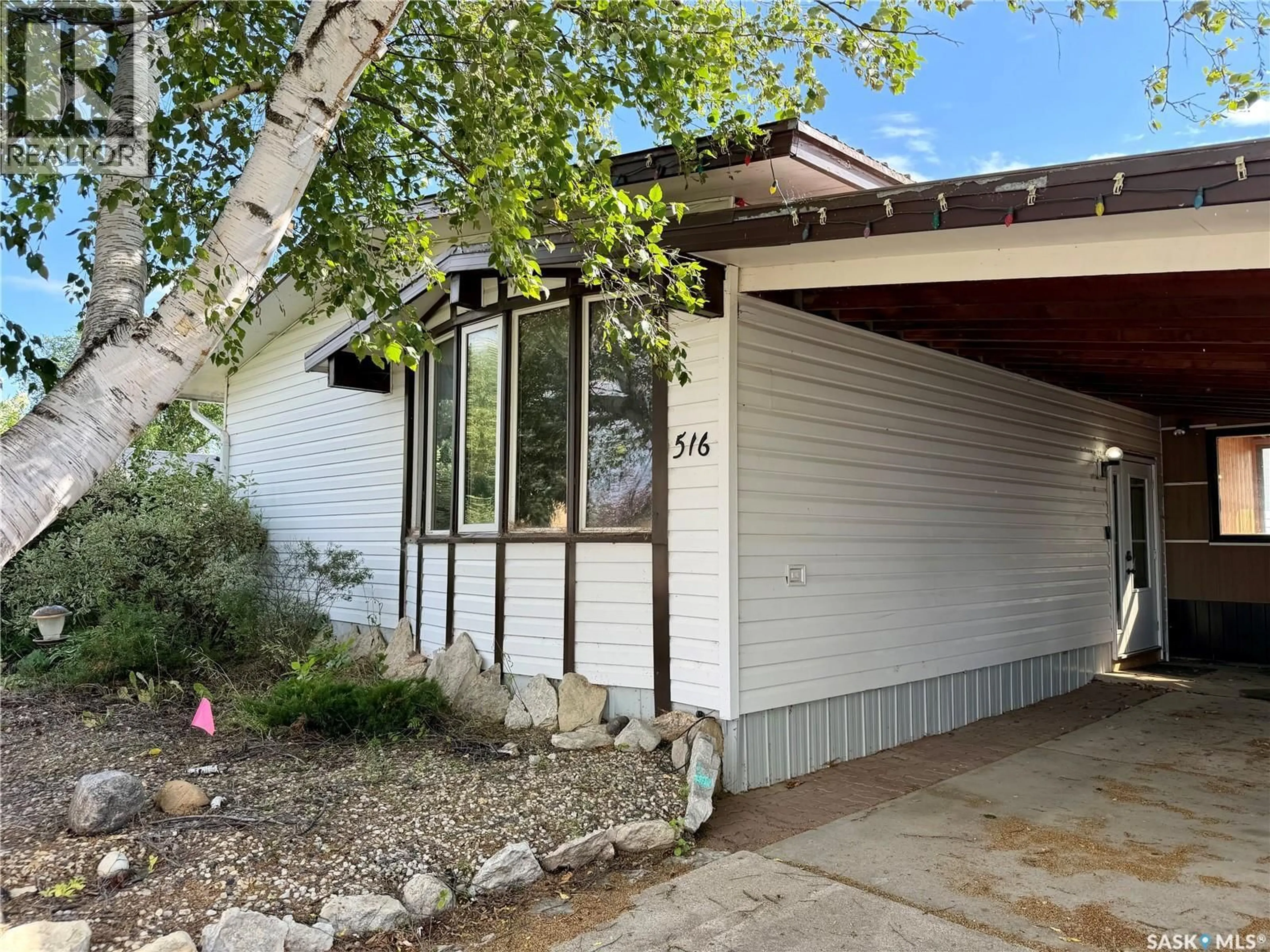 Home with vinyl exterior material, street for 516 SCOTIA STREET, Melfort Saskatchewan S0E1A0