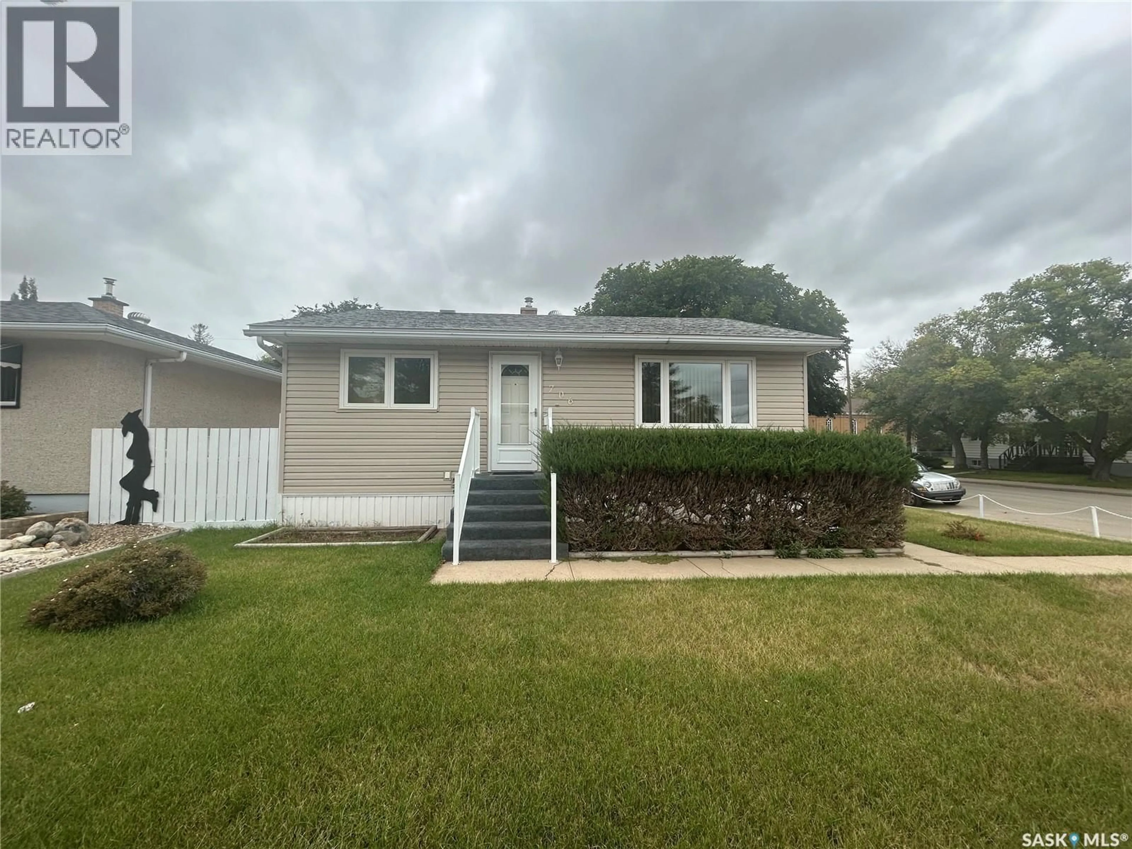 Home with vinyl exterior material, street for 706 VAUGHAN STREET, Moose Jaw Saskatchewan S6H5N5