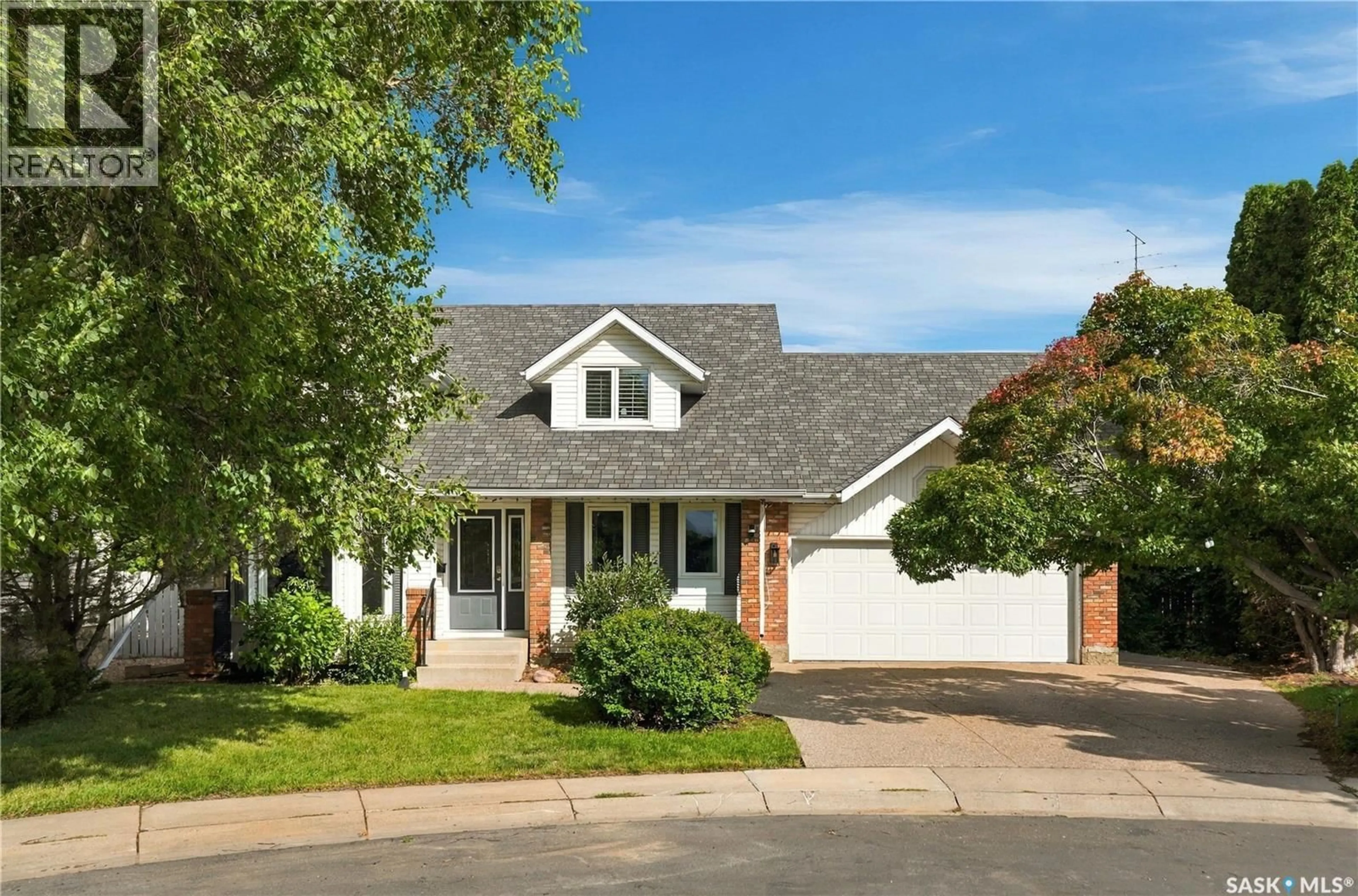 Home with brick exterior material, street for 334 MULCASTER COURT, Saskatoon Saskatchewan S7N4B1
