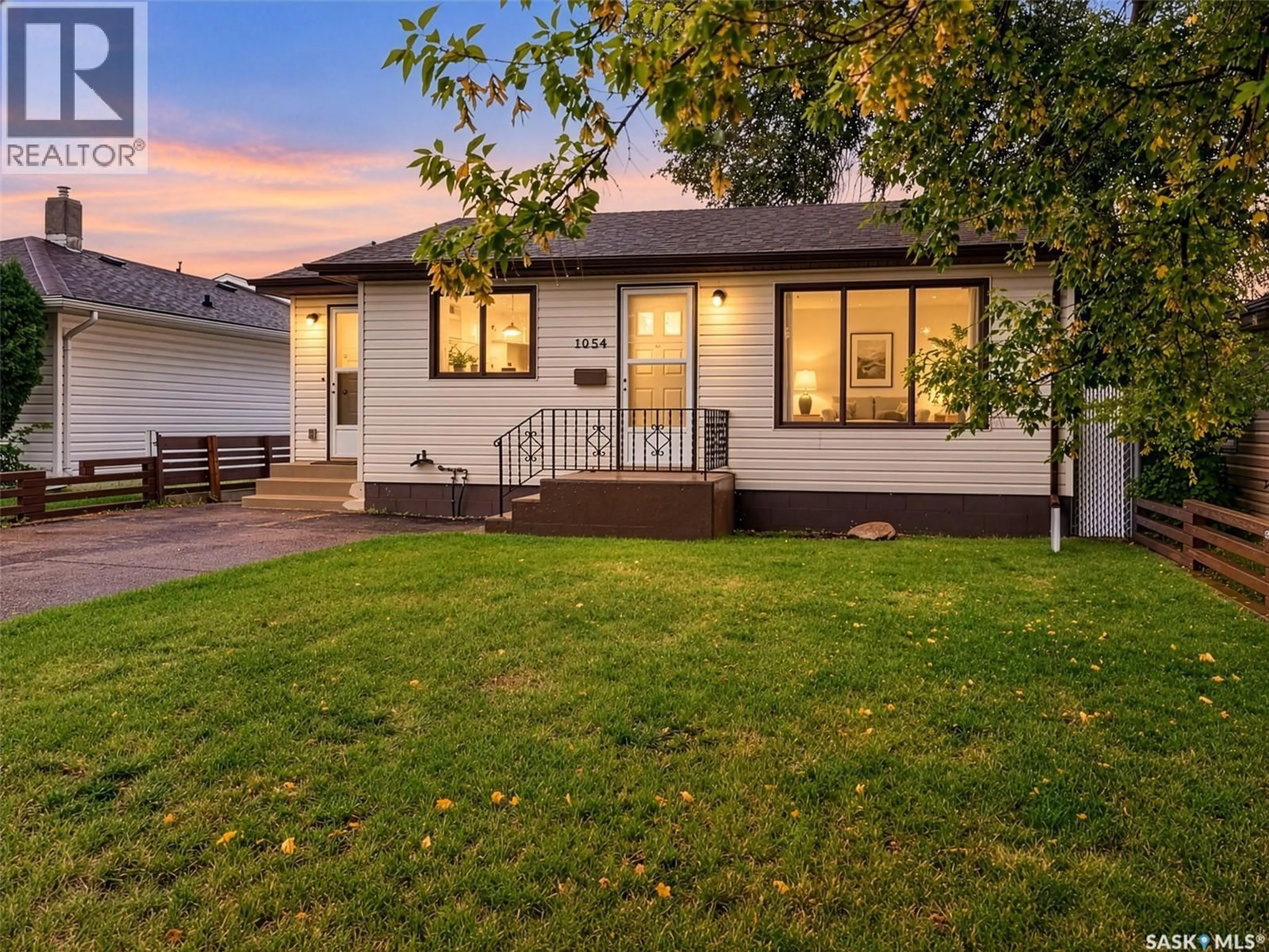 Home with vinyl exterior material, street for 1054 VAUGHAN STREET, Moose Jaw Saskatchewan S6H5P2