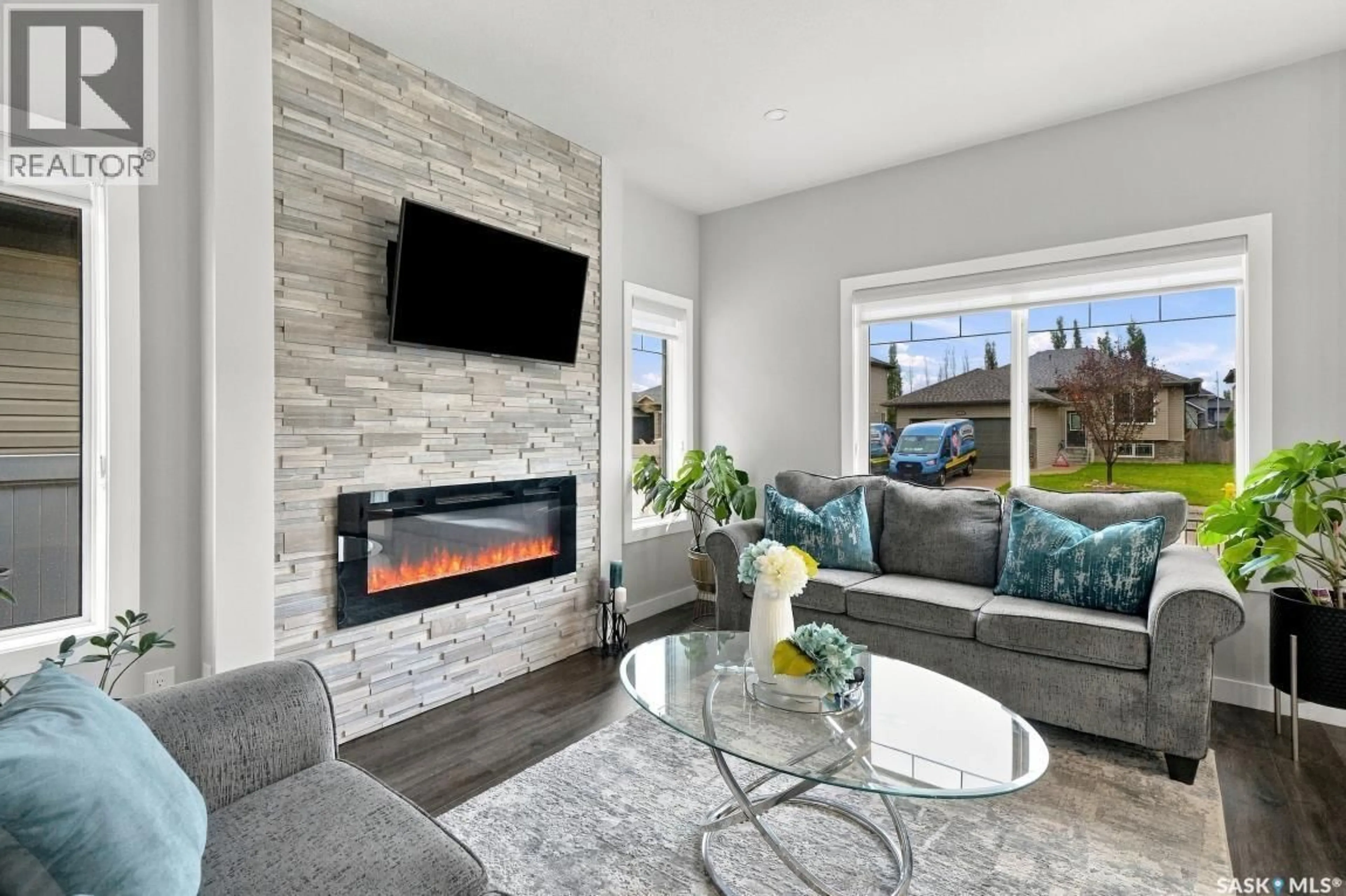 Living room with furniture, unknown for 4 525 MAHABIR LANE, Saskatoon Saskatchewan S7W1G1