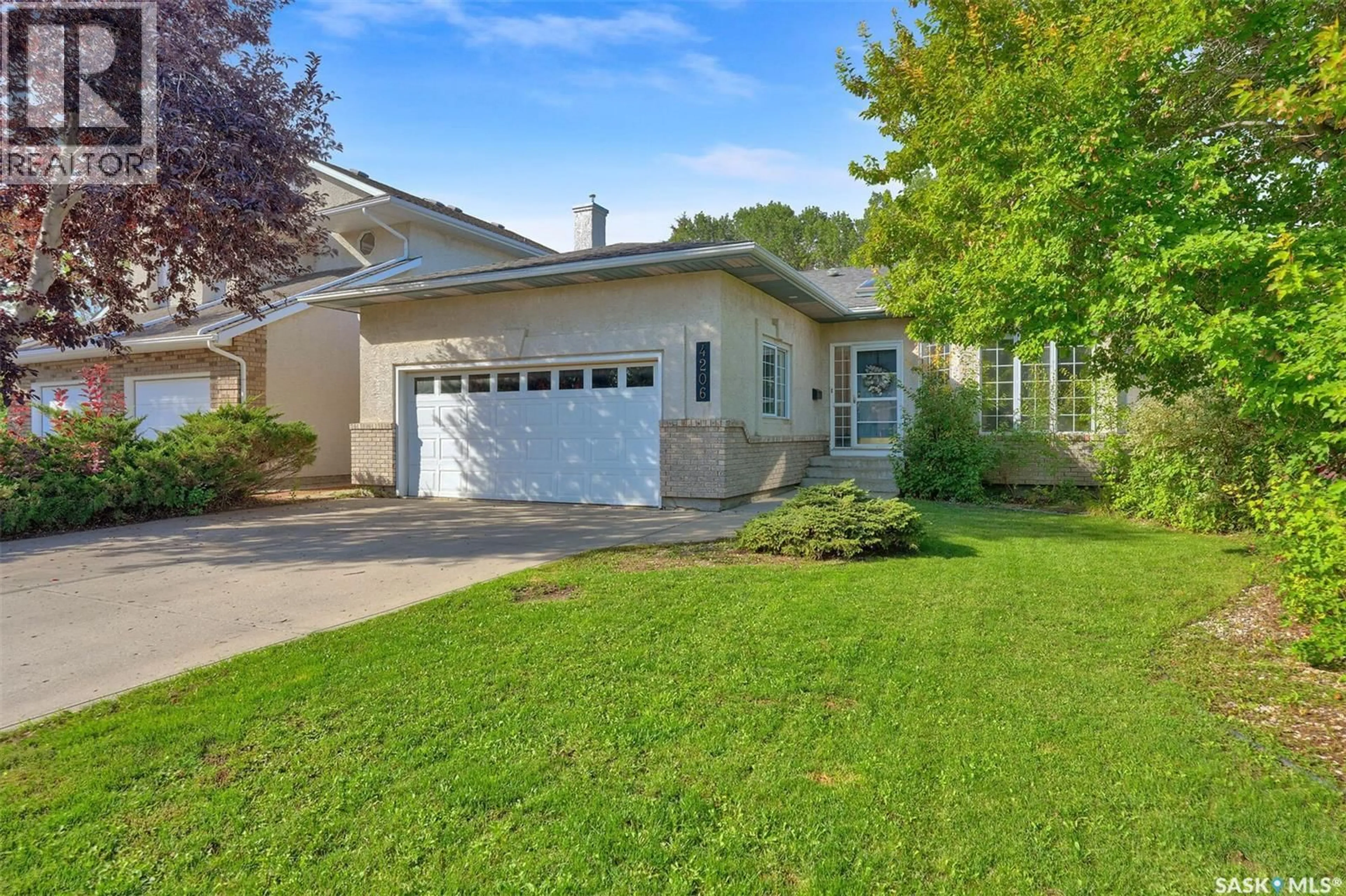 Home with vinyl exterior material, street for 4206 WASCANA RIDGE, Regina Saskatchewan S4V2T1