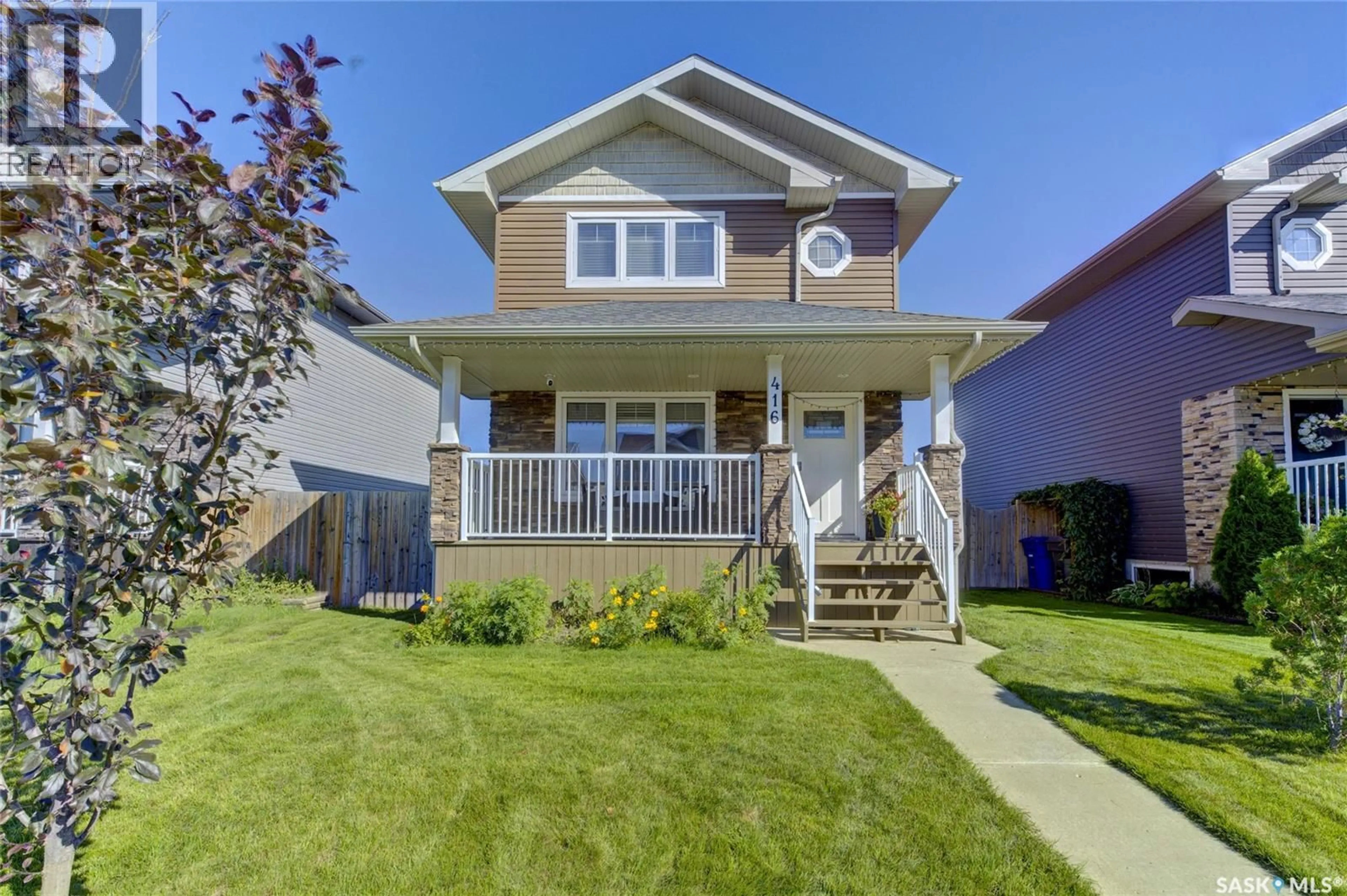 Home with vinyl exterior material, street for 416 REDWOOD CRESCENT, Warman Saskatchewan S0K0A1