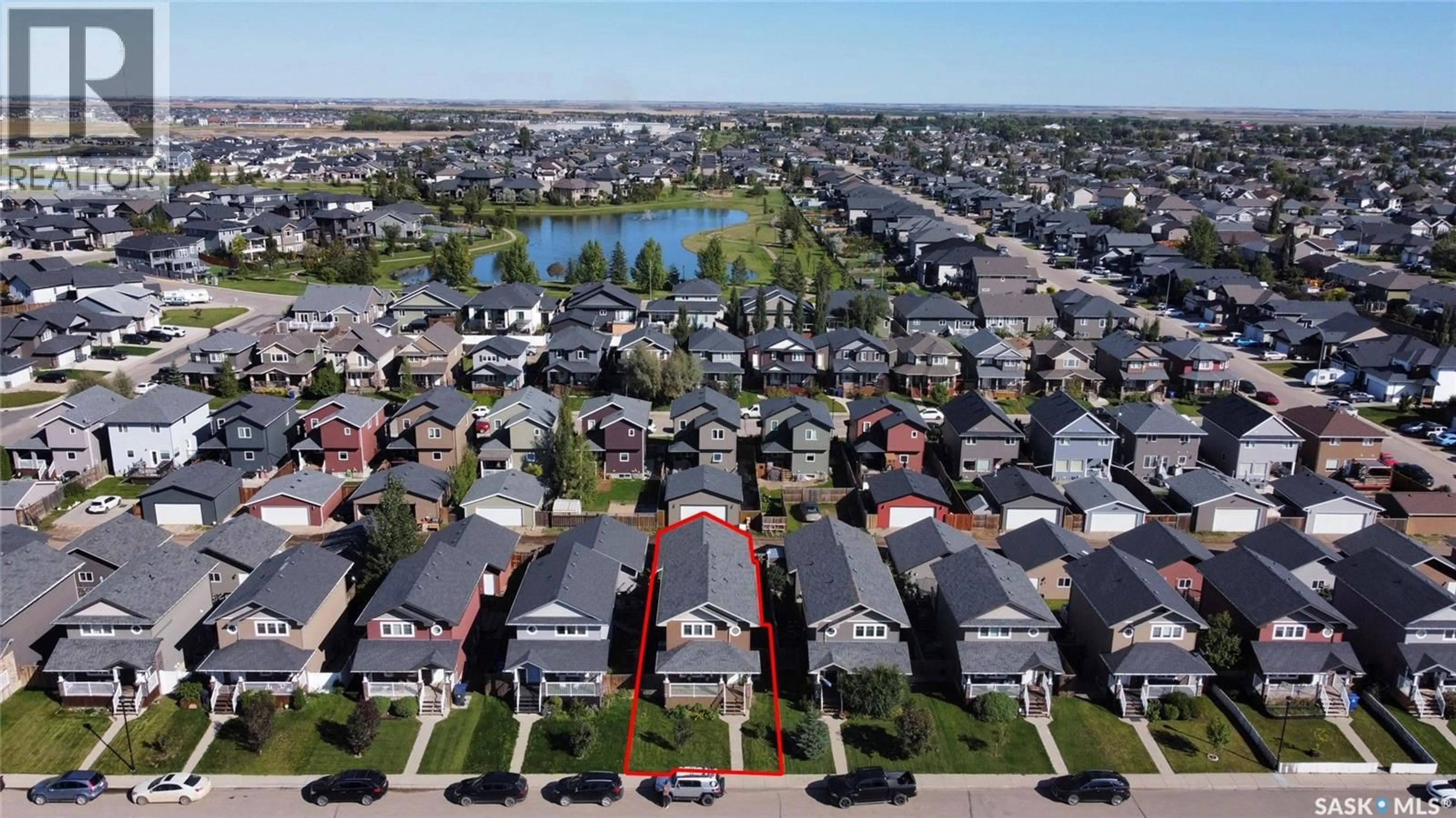 A pic from outside/outdoor area/front of a property/back of a property/a pic from drone, street for 416 REDWOOD CRESCENT, Warman Saskatchewan S0K0A1