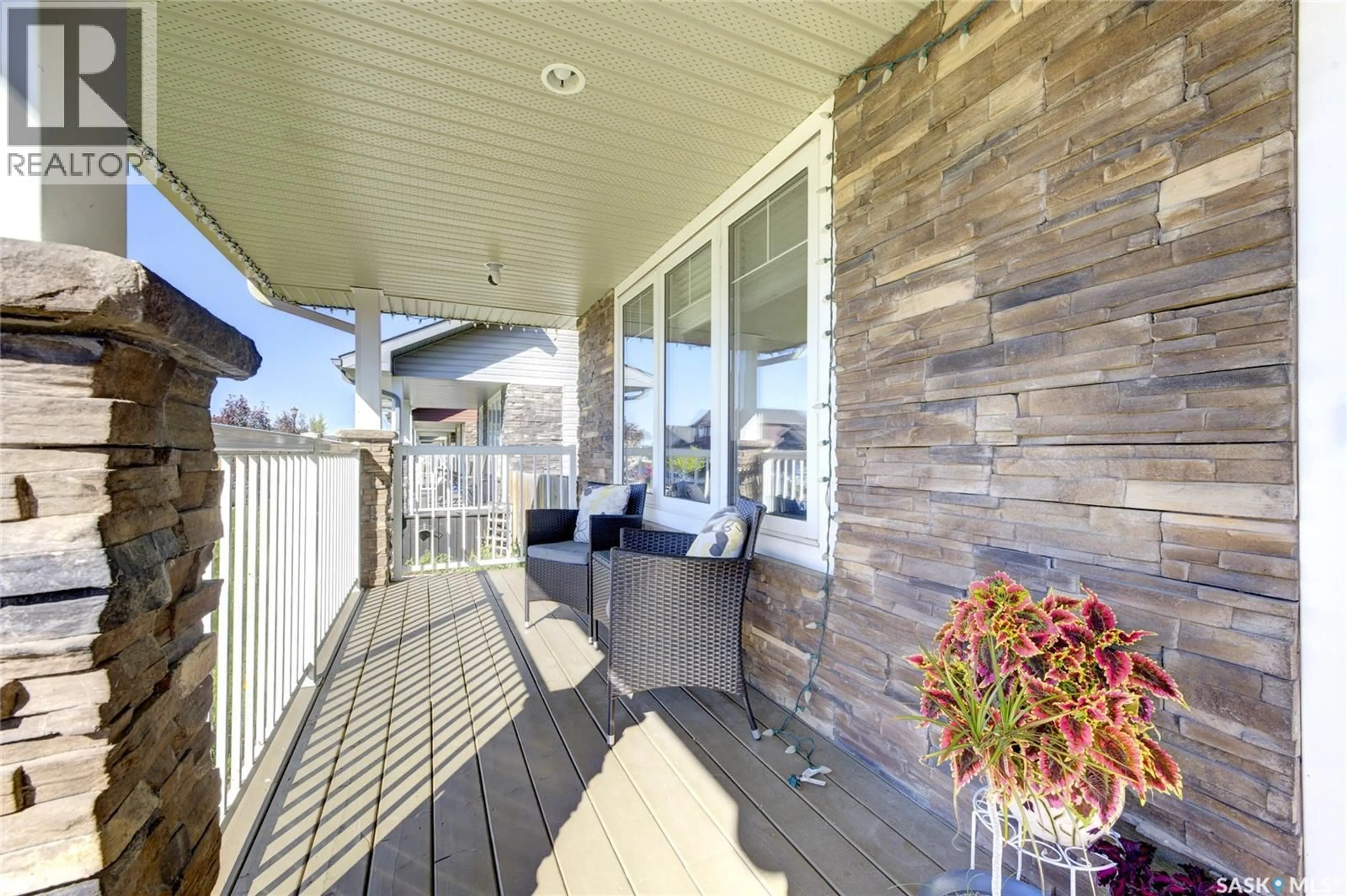Patio, street for 416 REDWOOD CRESCENT, Warman Saskatchewan S0K0A1