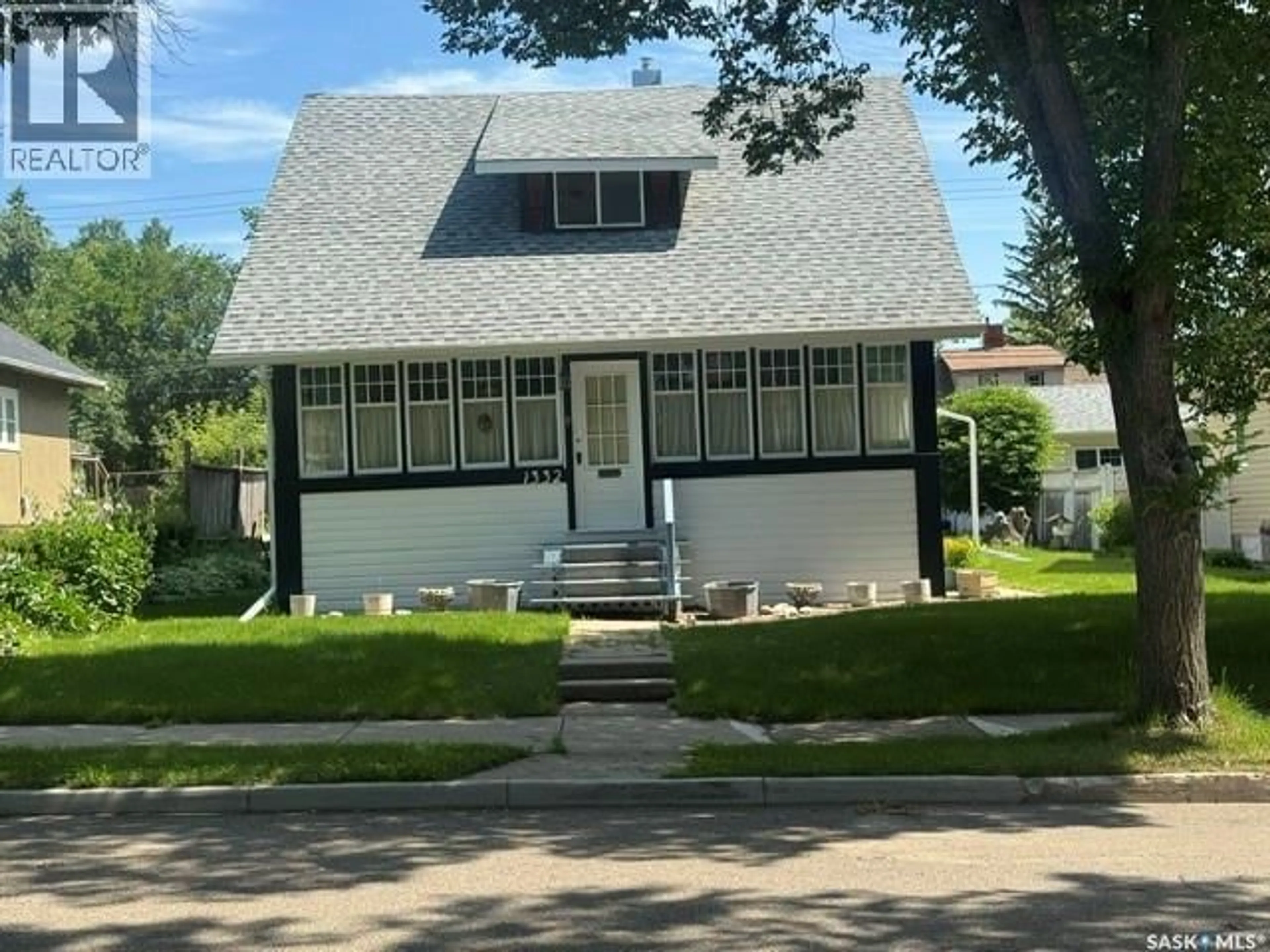 Home with vinyl exterior material, street for 1332 97TH STREET, North Battleford Saskatchewan S9A0J8
