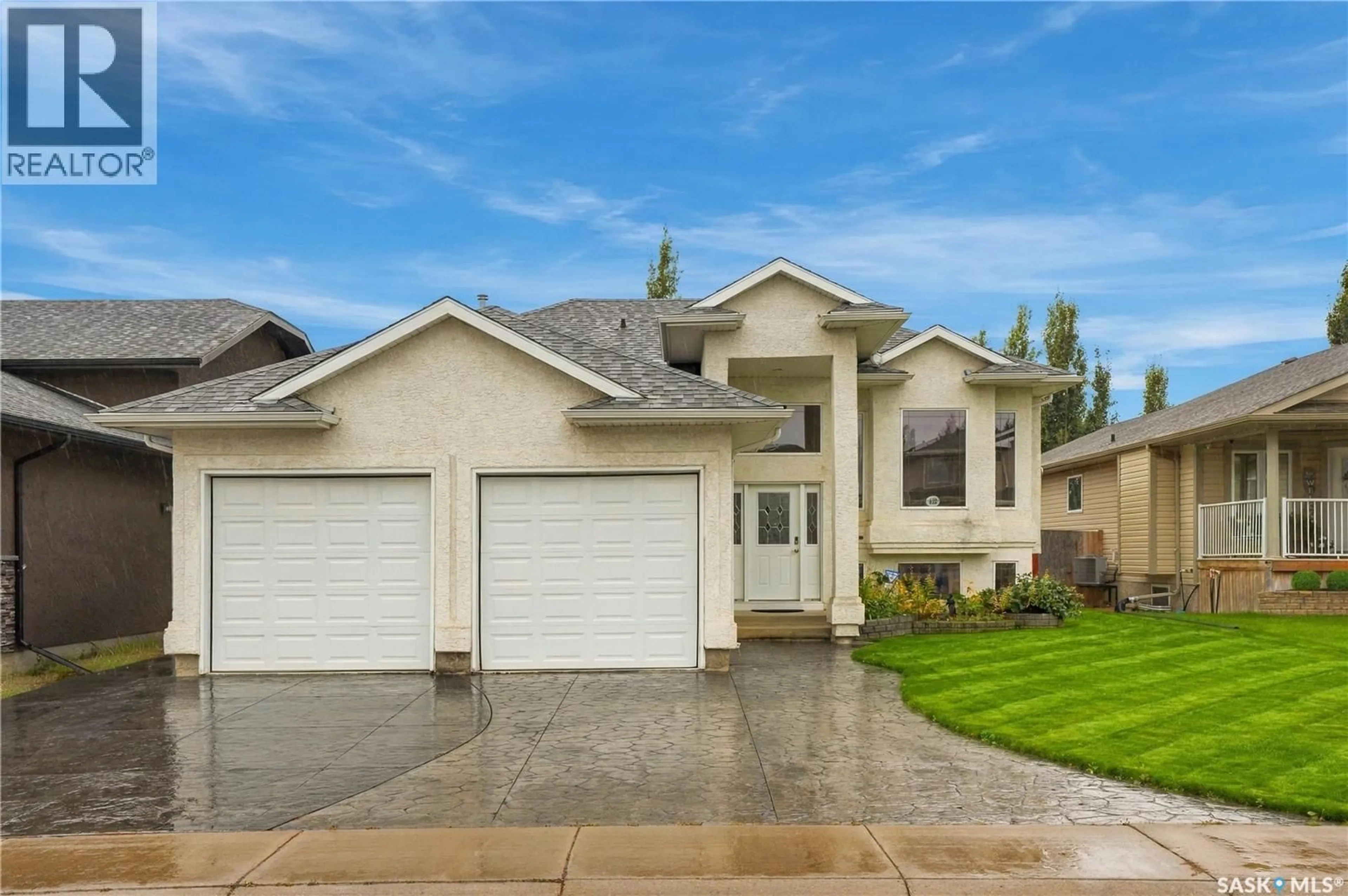 Home with vinyl exterior material, street for 822 ROCK HILL LANE, Martensville Saskatchewan S0K0A2