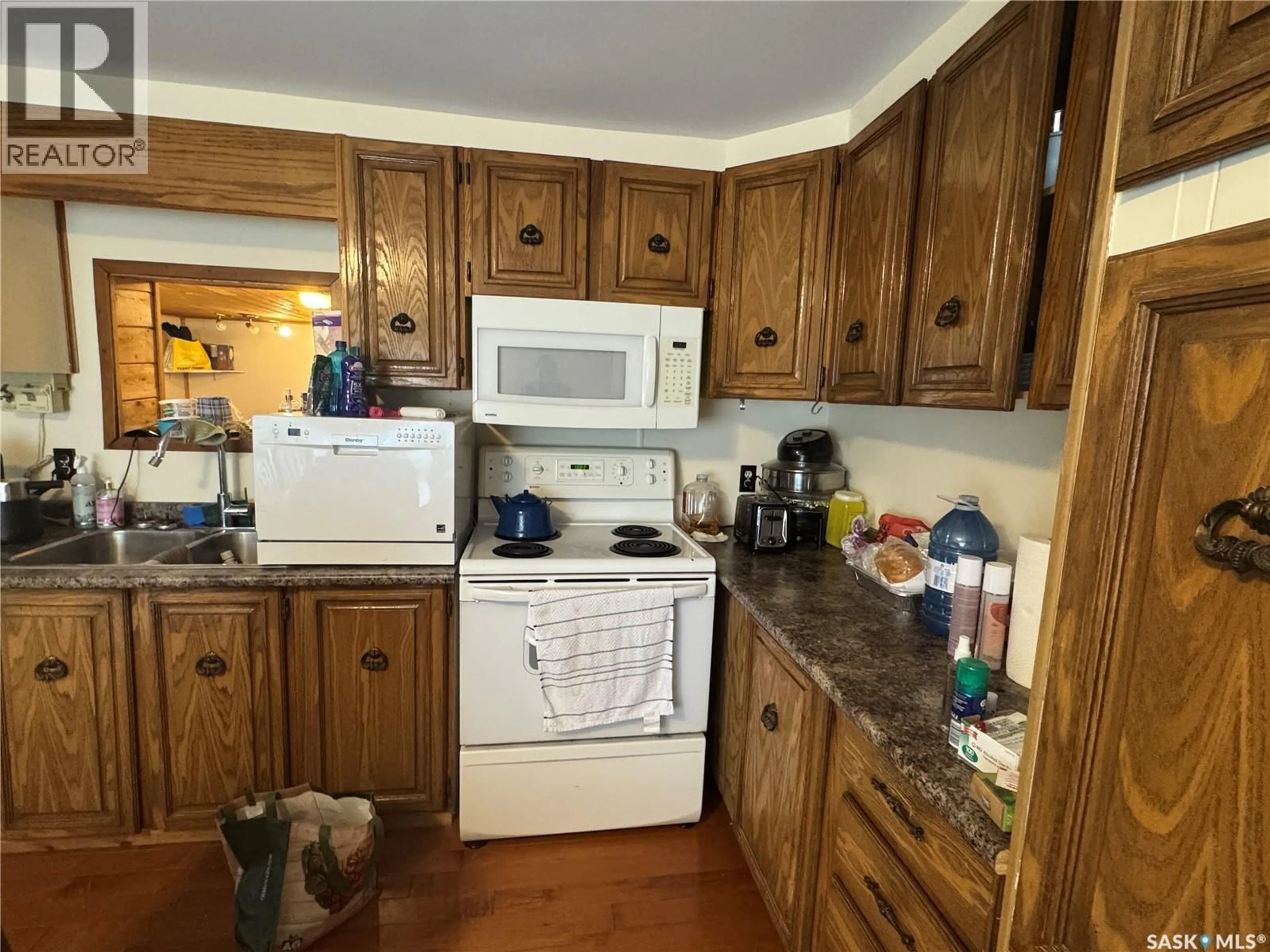 Standard kitchen, wood/laminate floor for 1028 DALBY CRESCENT, La Ronge Saskatchewan S0J1L0