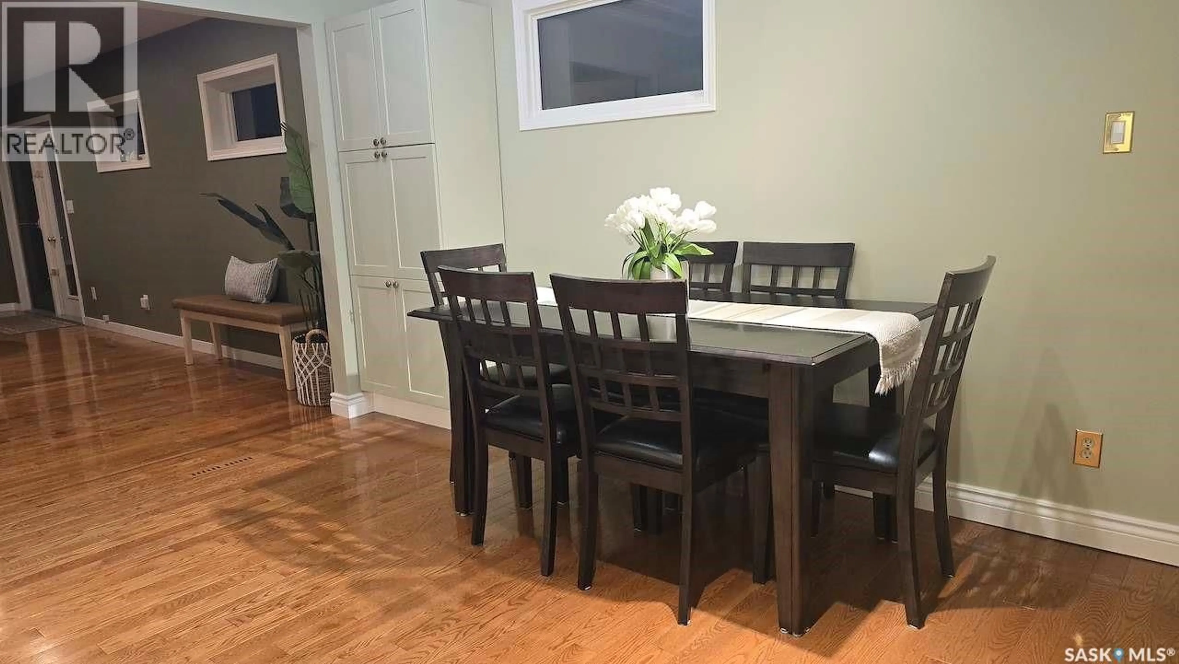 Dining room, wood/laminate floor for 2133 MCKINNON AVENUE, Saskatoon Saskatchewan S7J1N3