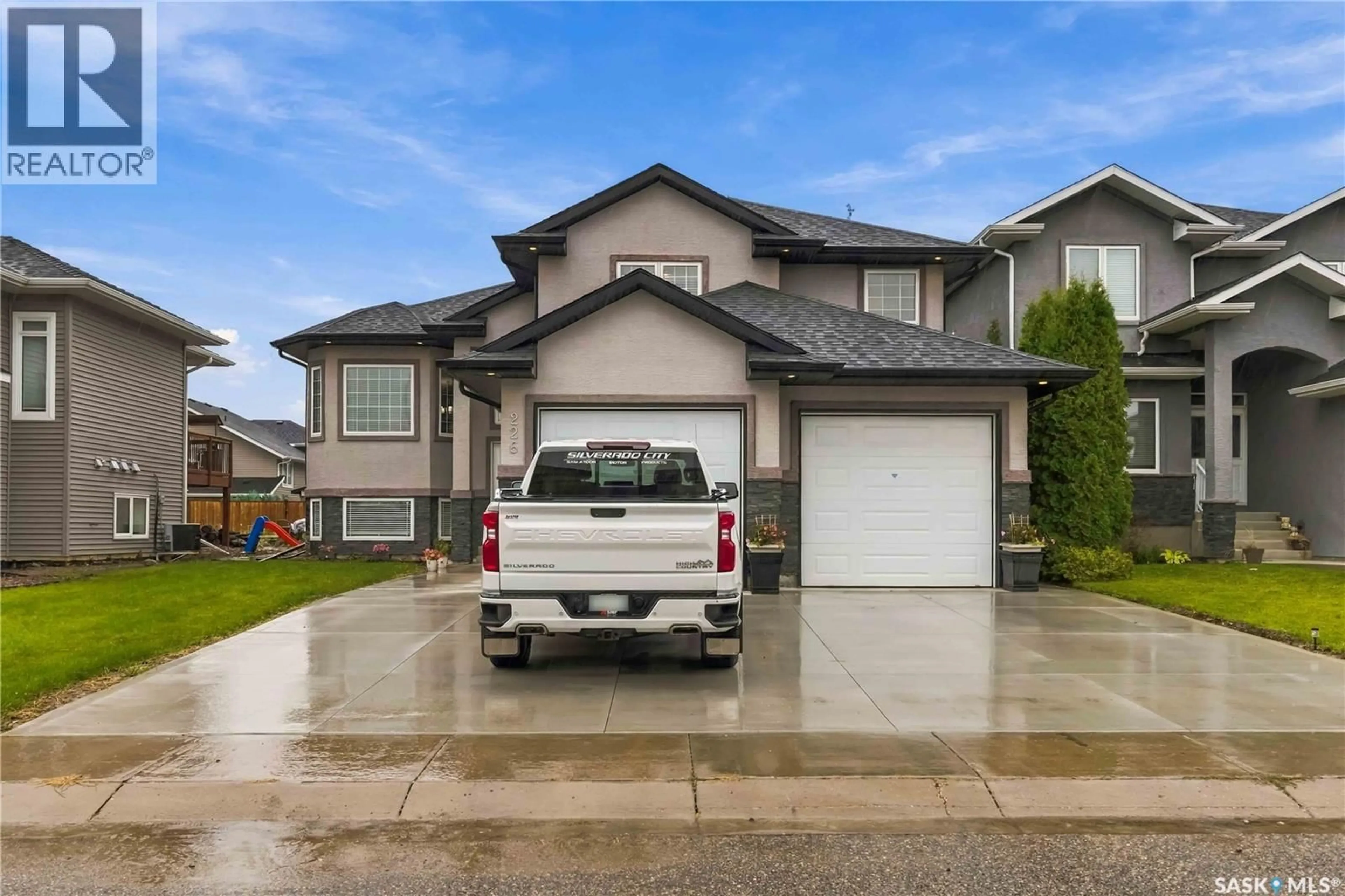 Home with vinyl exterior material, street for 226 PICHLER LANE, Saskatoon Saskatchewan S7V1A8