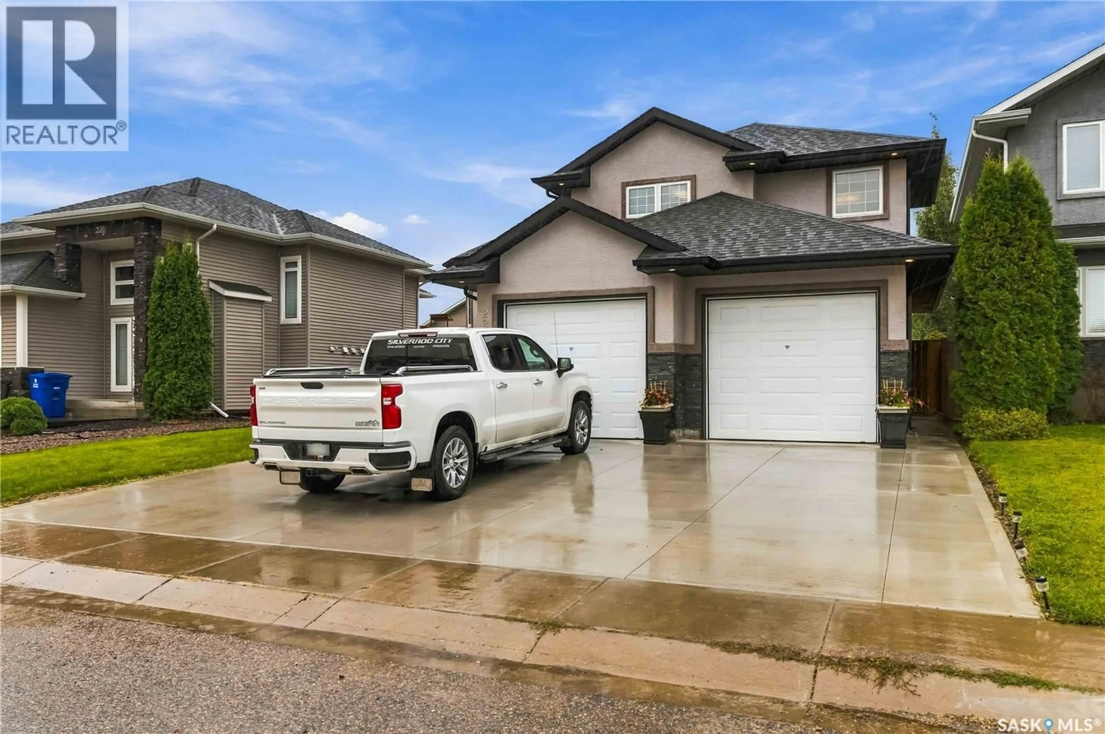 Home with vinyl exterior material, street for 226 PICHLER LANE, Saskatoon Saskatchewan S7V1A8