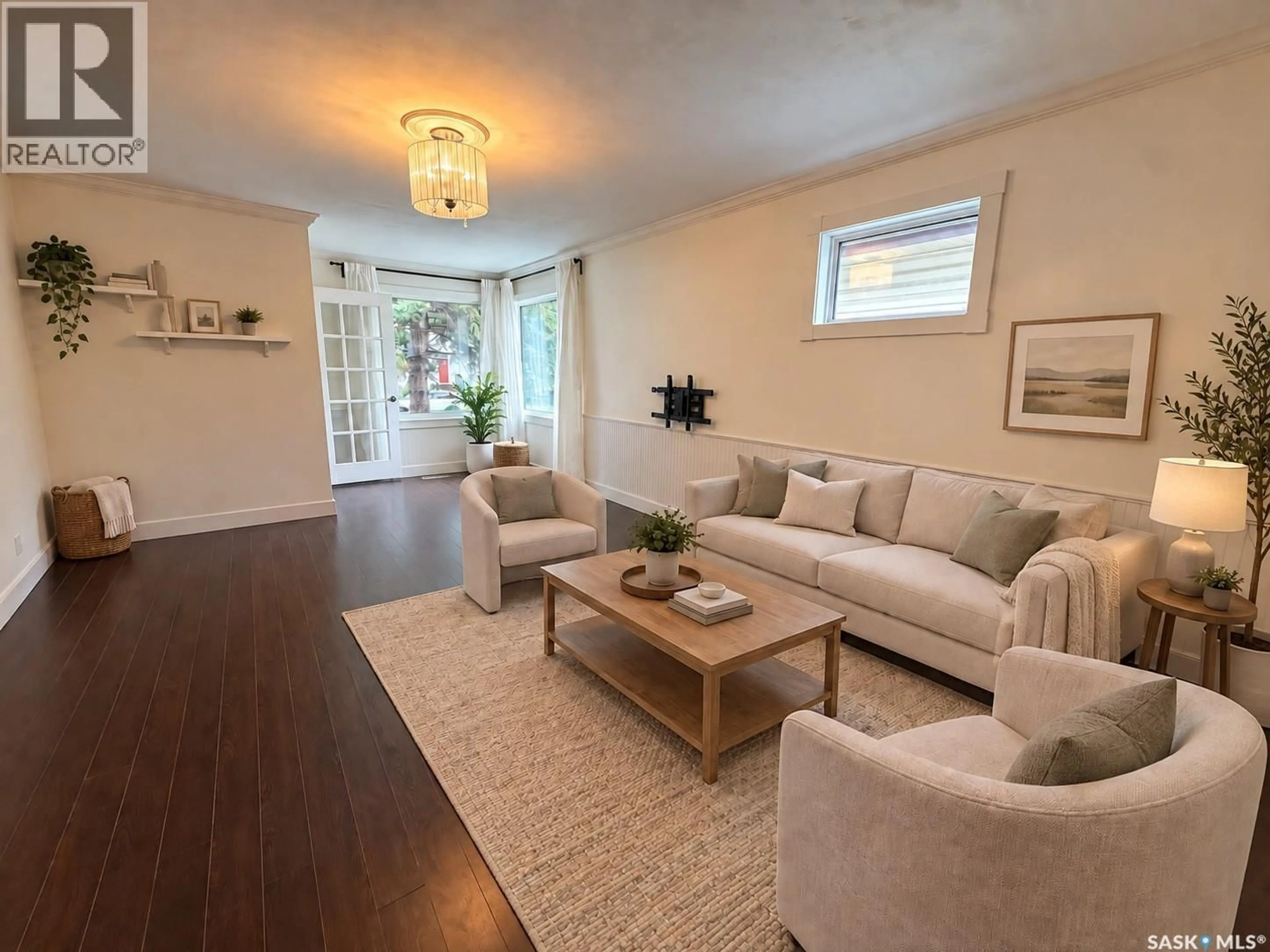 Living room with furniture, wood/laminate floor for 3054 ATHOL STREET, Regina Saskatchewan S4S1Y5