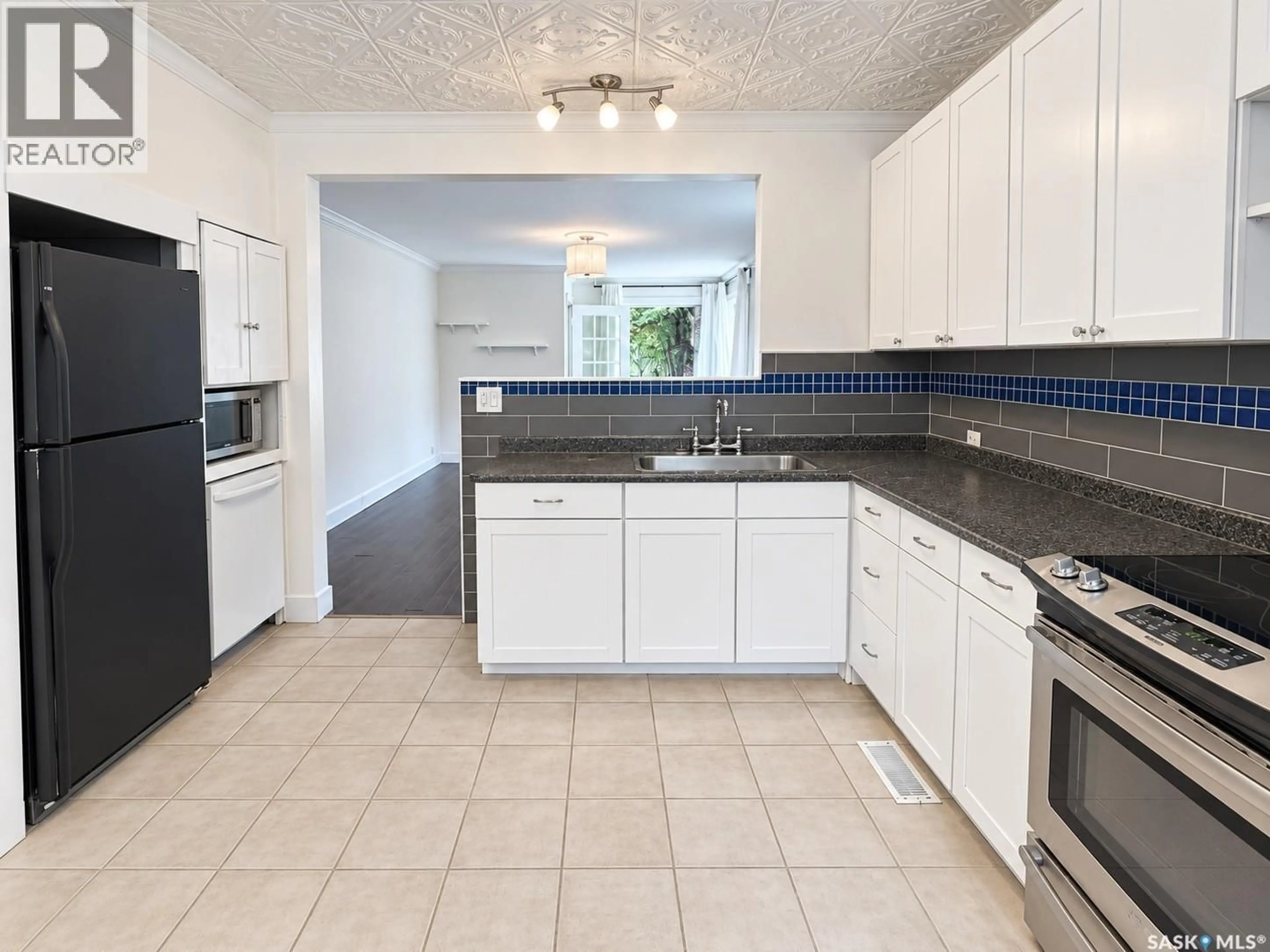 Standard kitchen, ceramic/tile floor for 3054 ATHOL STREET, Regina Saskatchewan S4S1Y5