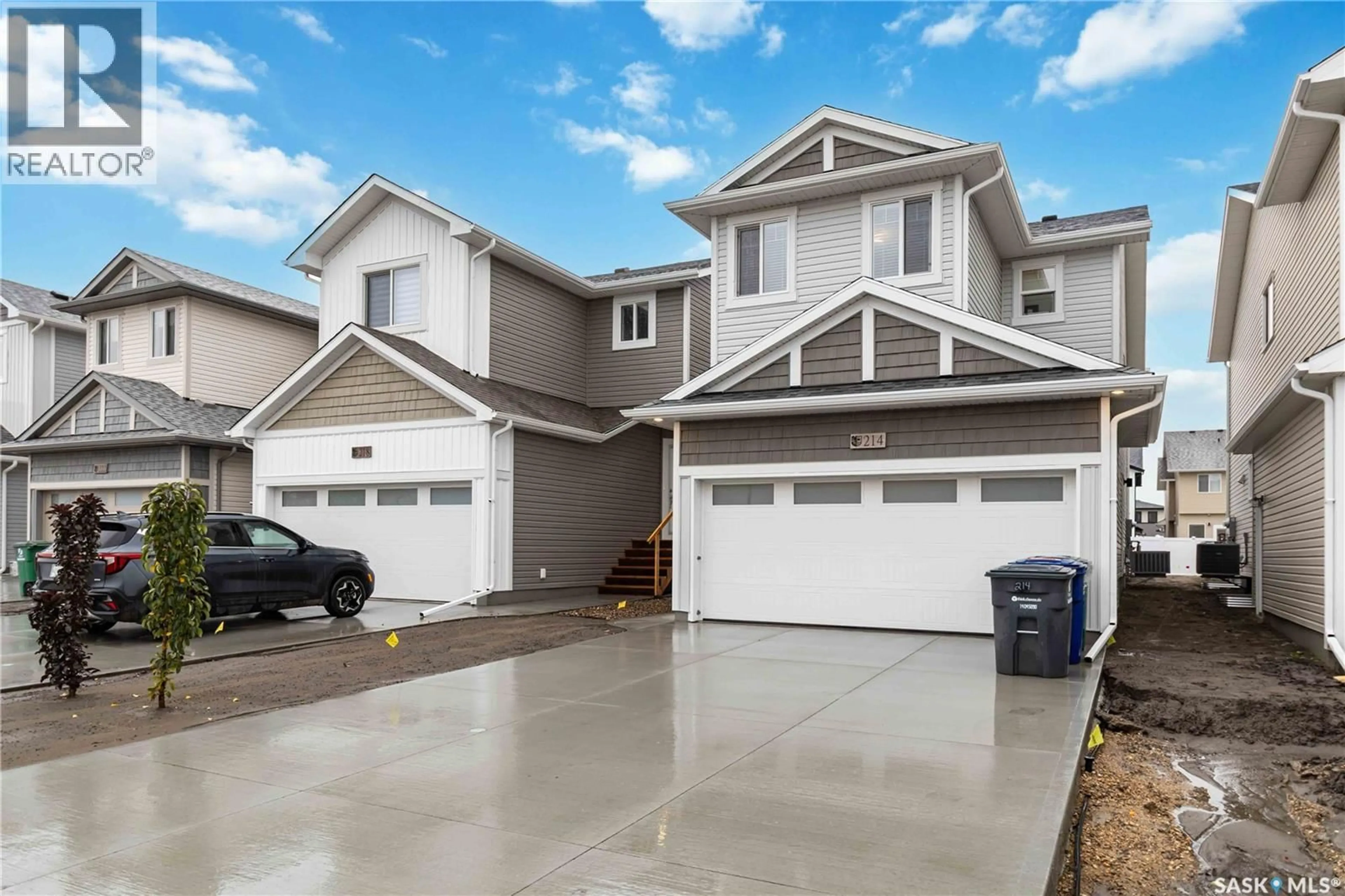 Home with vinyl exterior material, street for 214 ANTONINI COURT, Saskatoon Saskatchewan S7L7P3