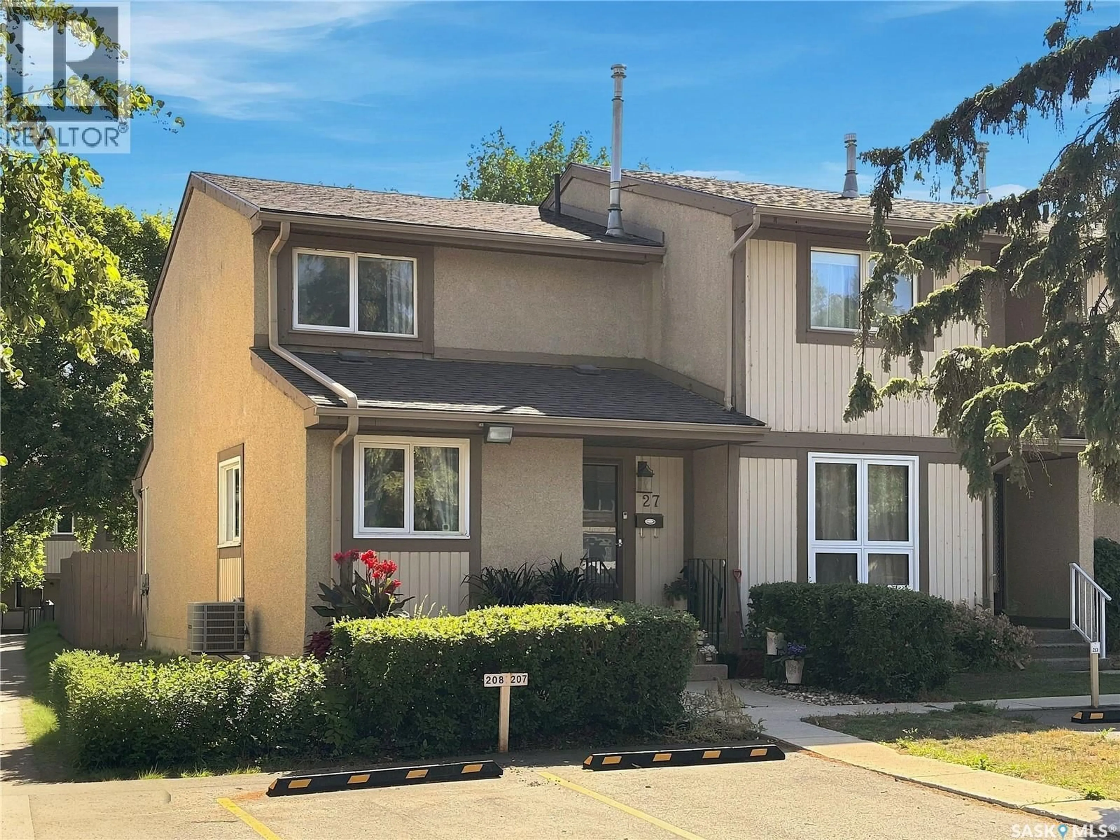 Home with vinyl exterior material, street for 1128 - 27 MCKERCHER DRIVE, Saskatoon Saskatchewan S7H4Y7