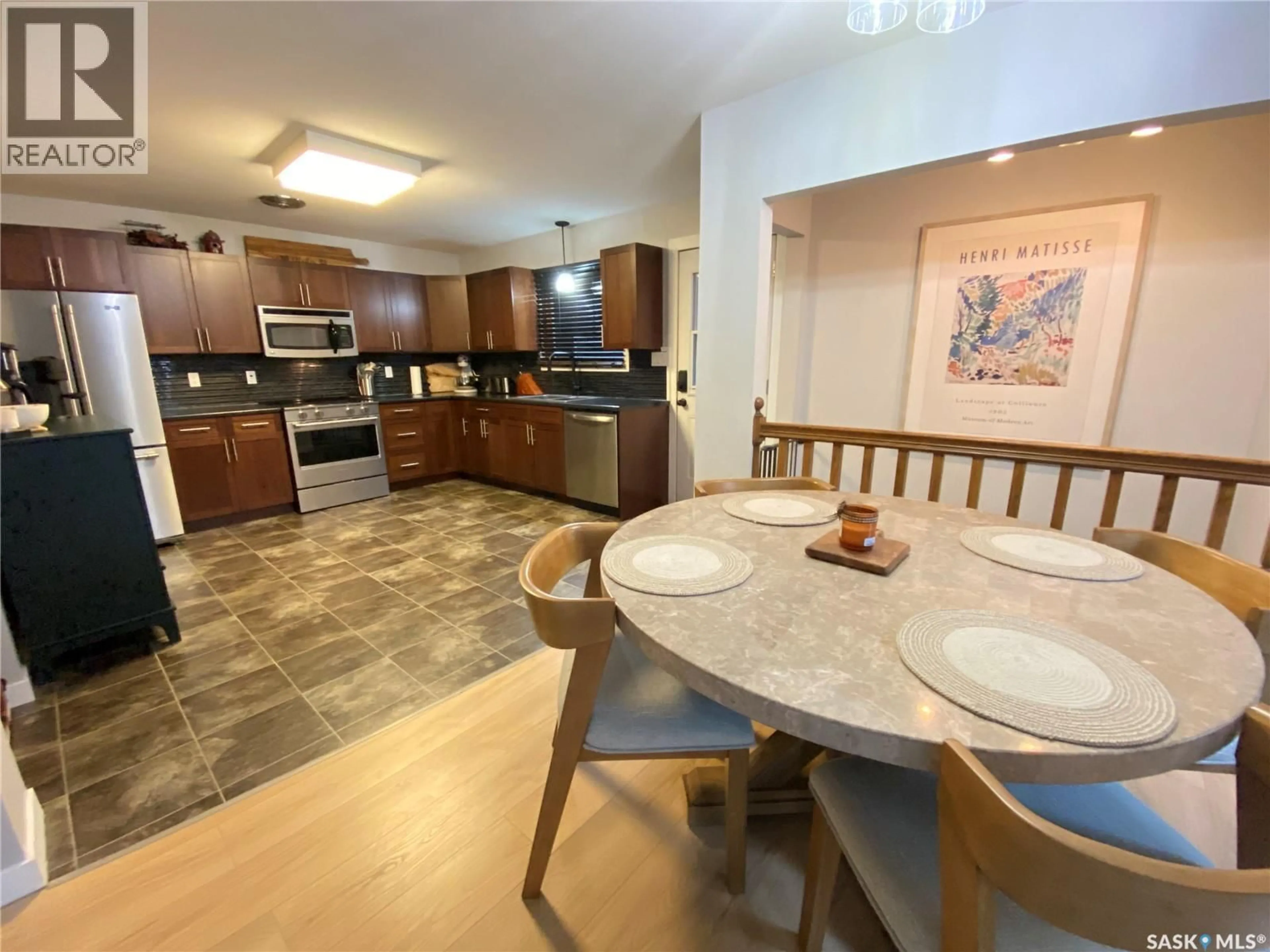 Open concept kitchen, ceramic/tile floor for 27 REAMAN AVENUE, Yorkton Saskatchewan S3N2B8