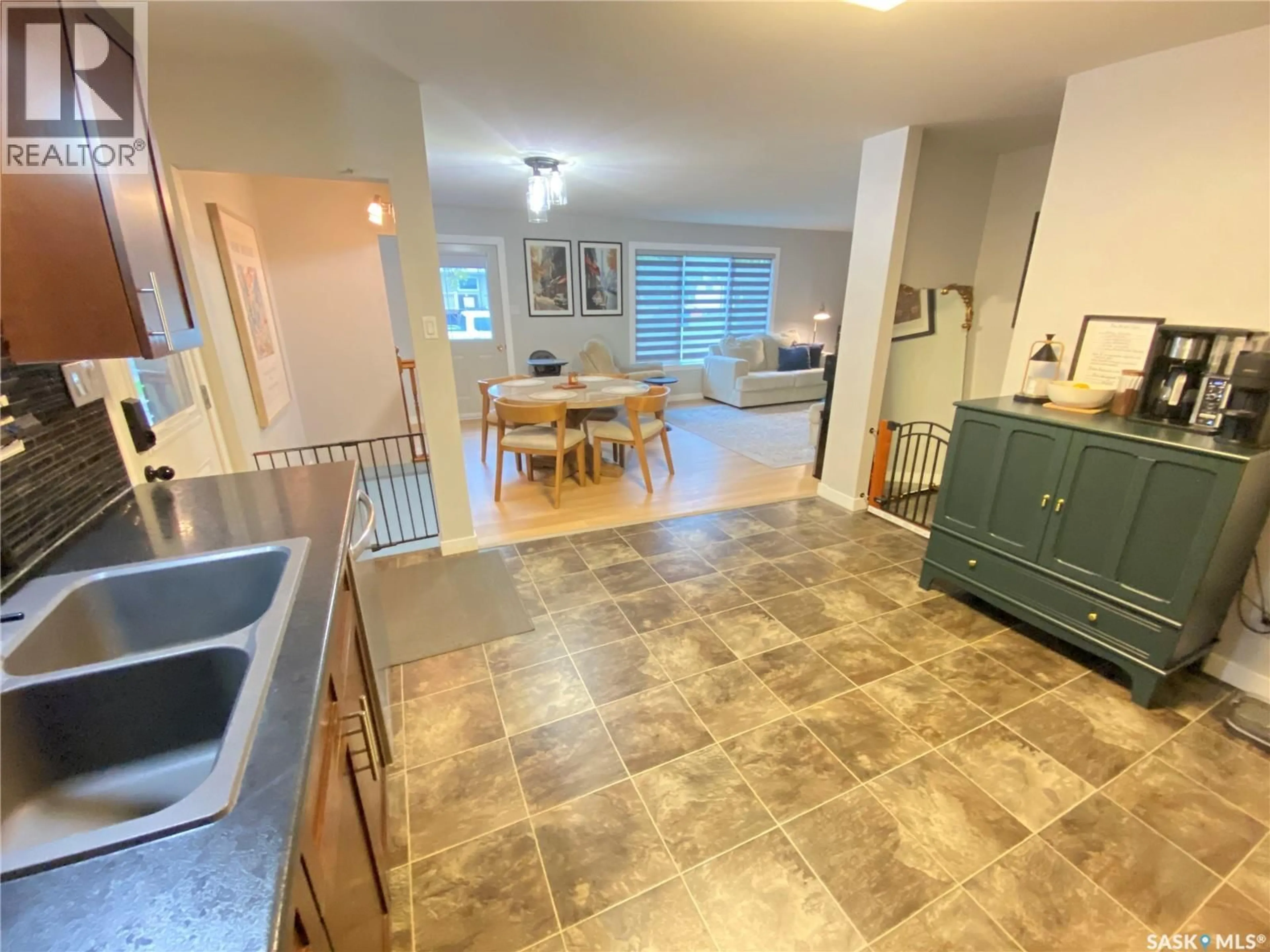 Open concept kitchen, ceramic/tile floor for 27 REAMAN AVENUE, Yorkton Saskatchewan S3N2B8
