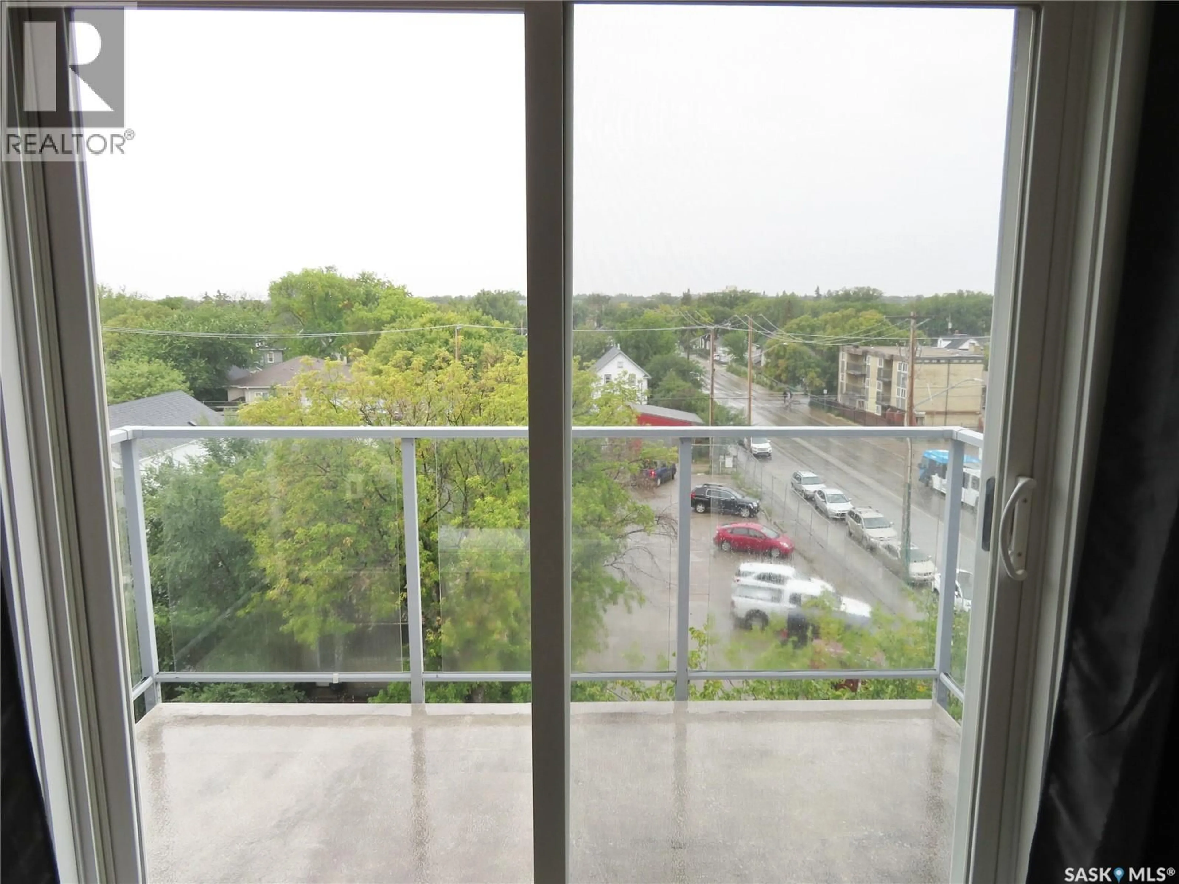 Balcony in the apartment, city buildings view from balcony for 404 C AVENUE, Saskatoon Saskatchewan S7M5M9