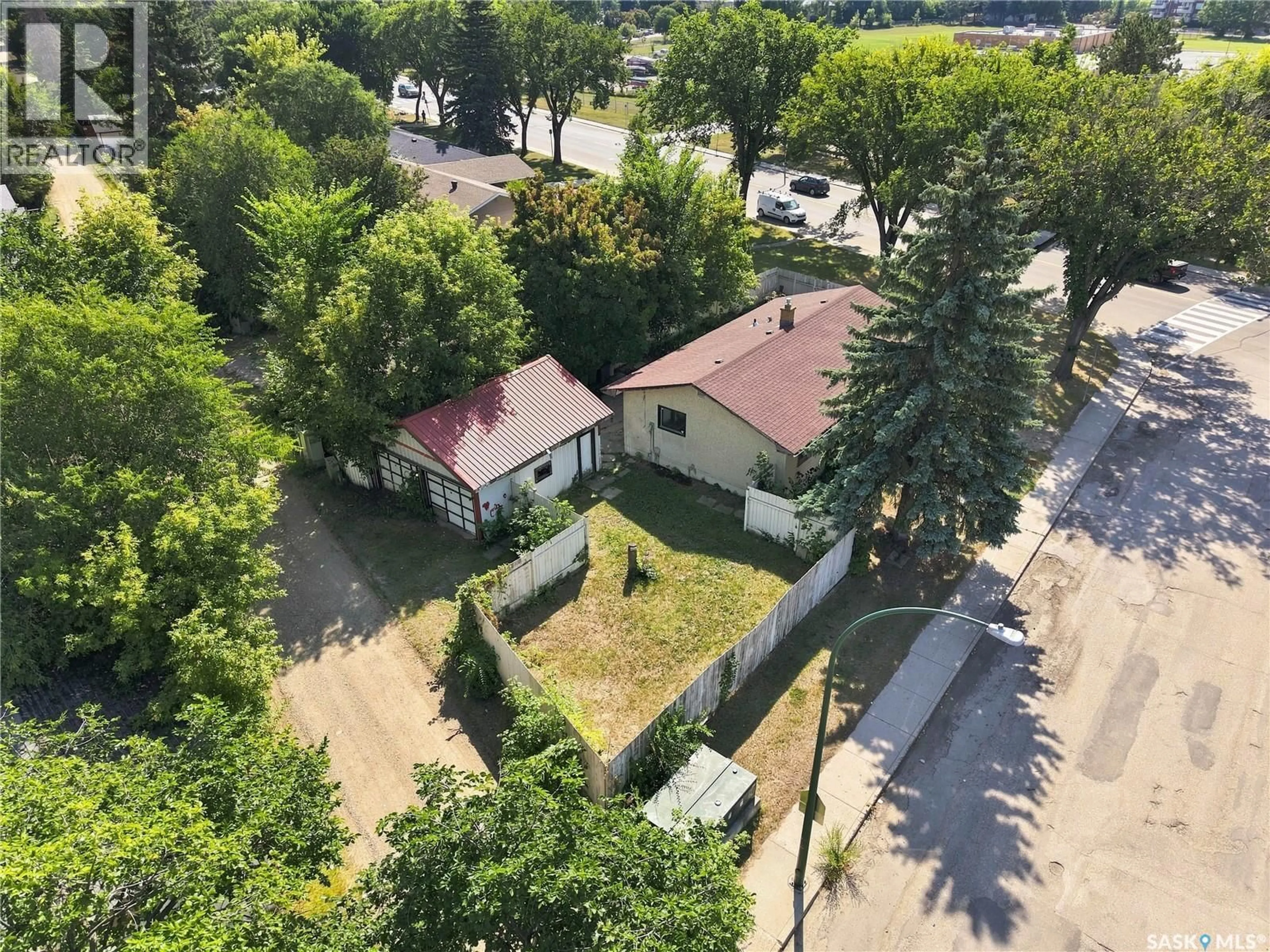 A pic from outside/outdoor area/front of a property/back of a property/a pic from drone, street for 2301 TAYLOR STREET, Saskatoon Saskatchewan S7H1W8