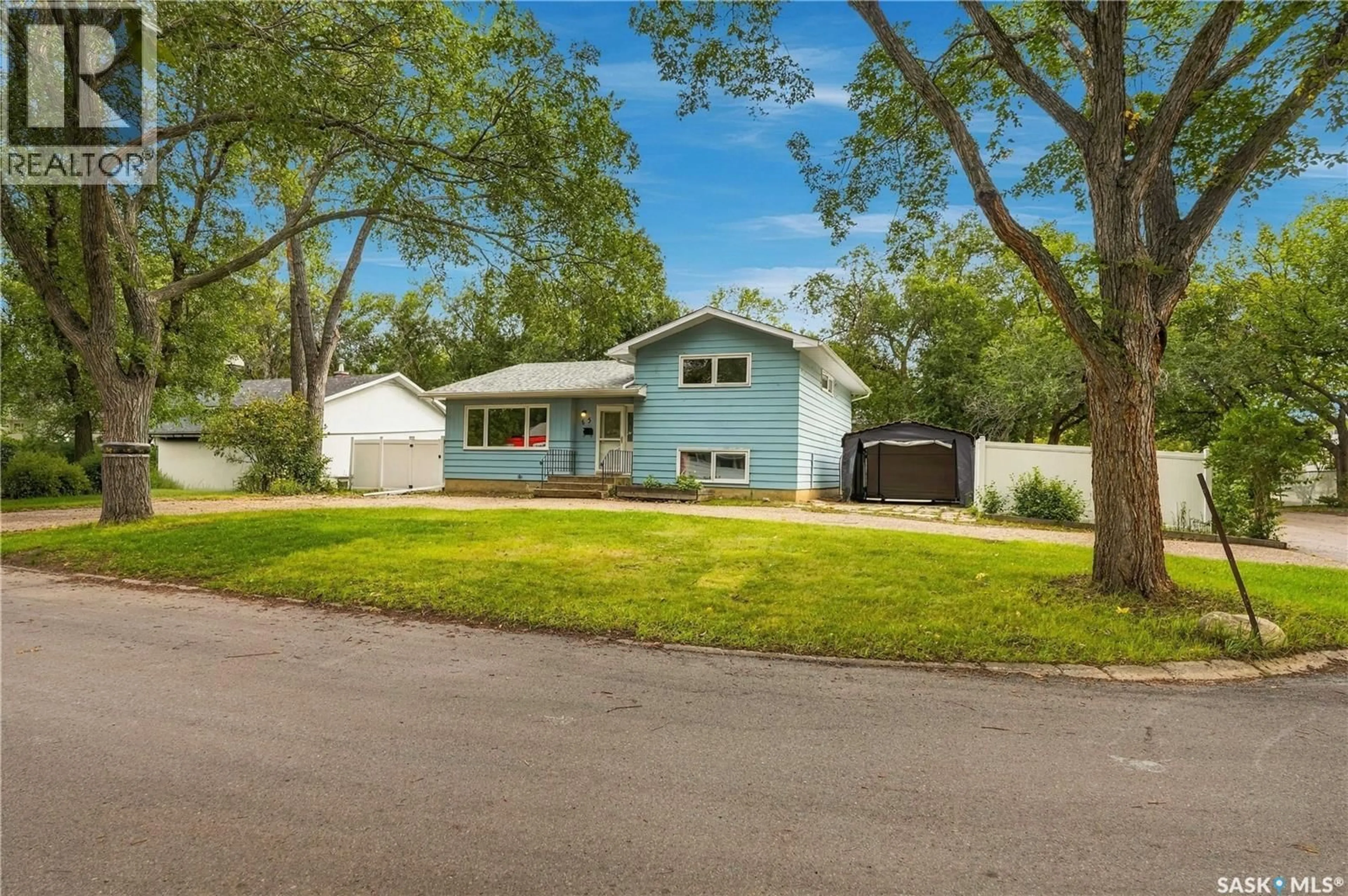 Home with vinyl exterior material, street for 65 BOBOLINK BAY, Regina Saskatchewan S4S4K2